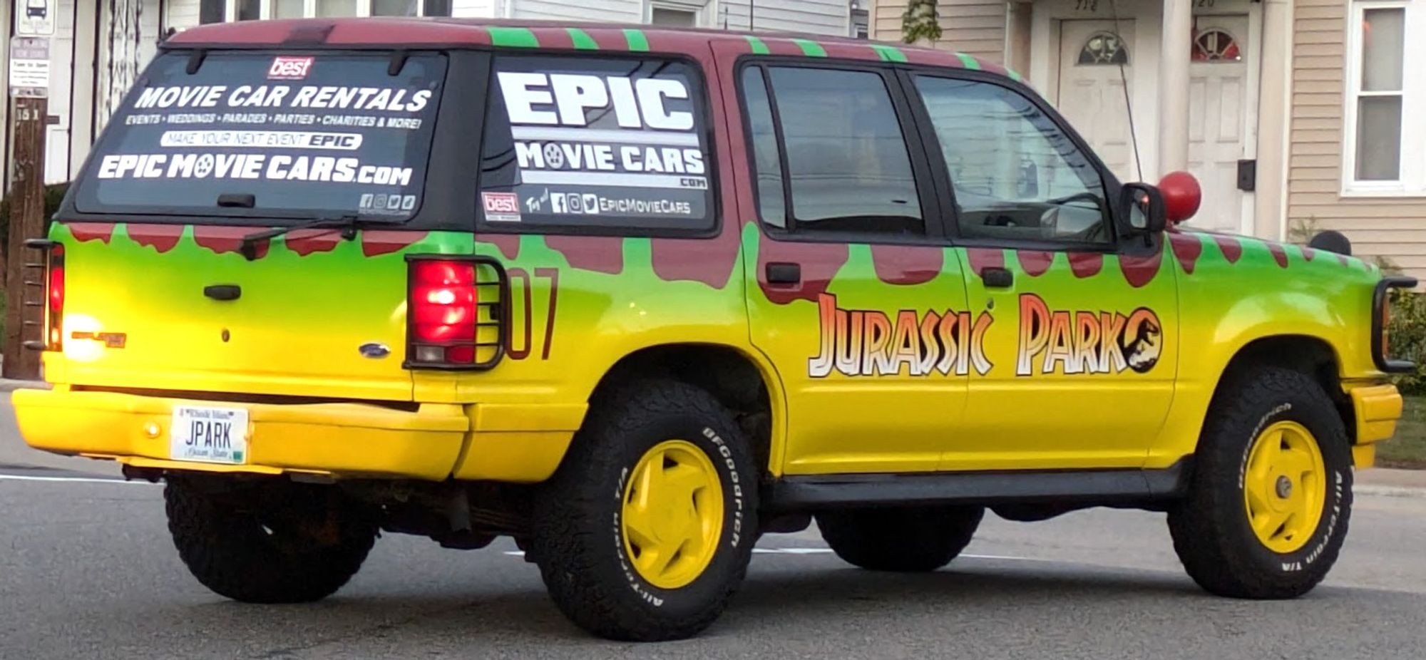 Jeep made to look like it's from the set of Jurassic Park, with RI vanity plate "JPARK".