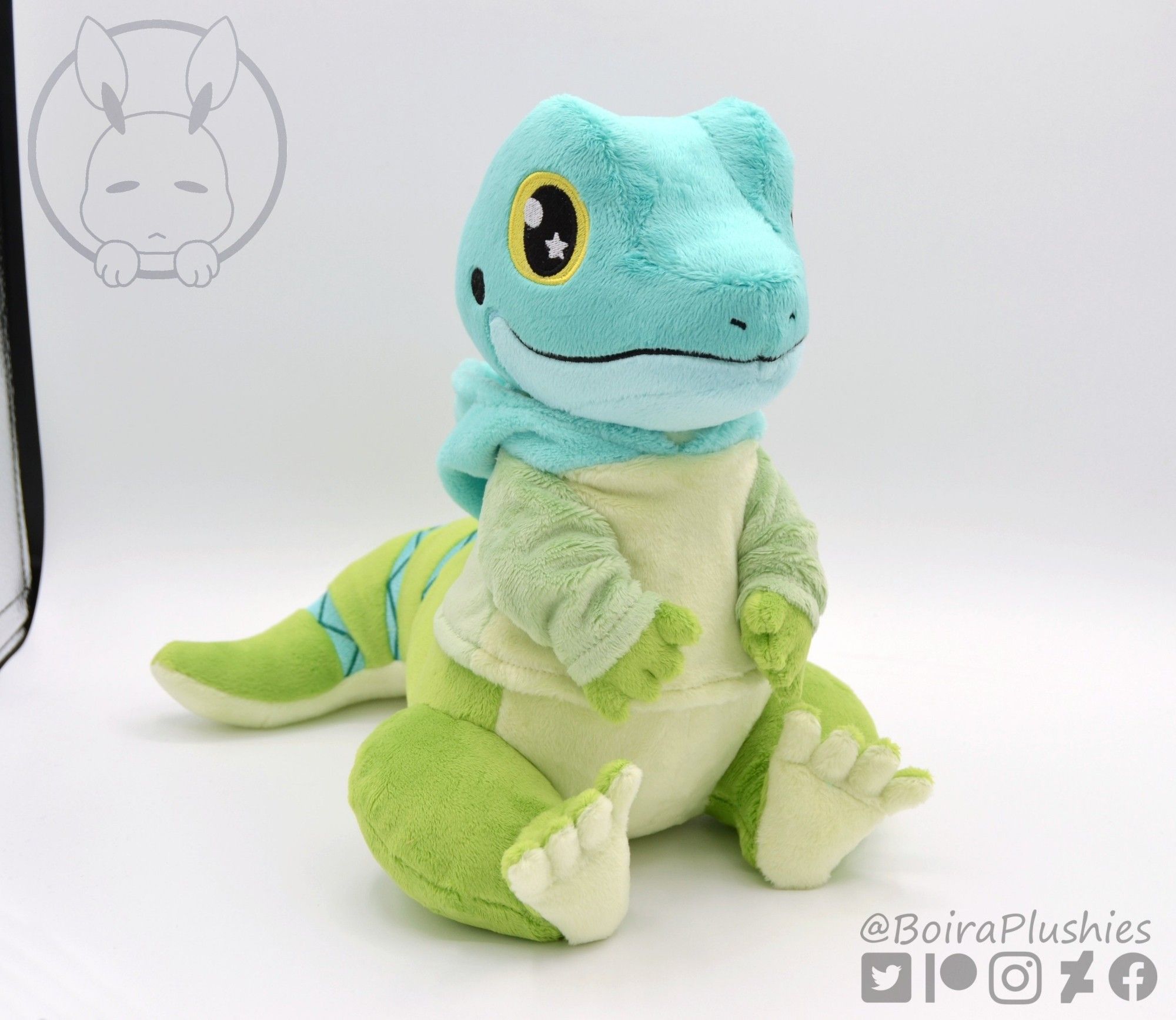 Handmade lizard plush with a hoodie. Green colors