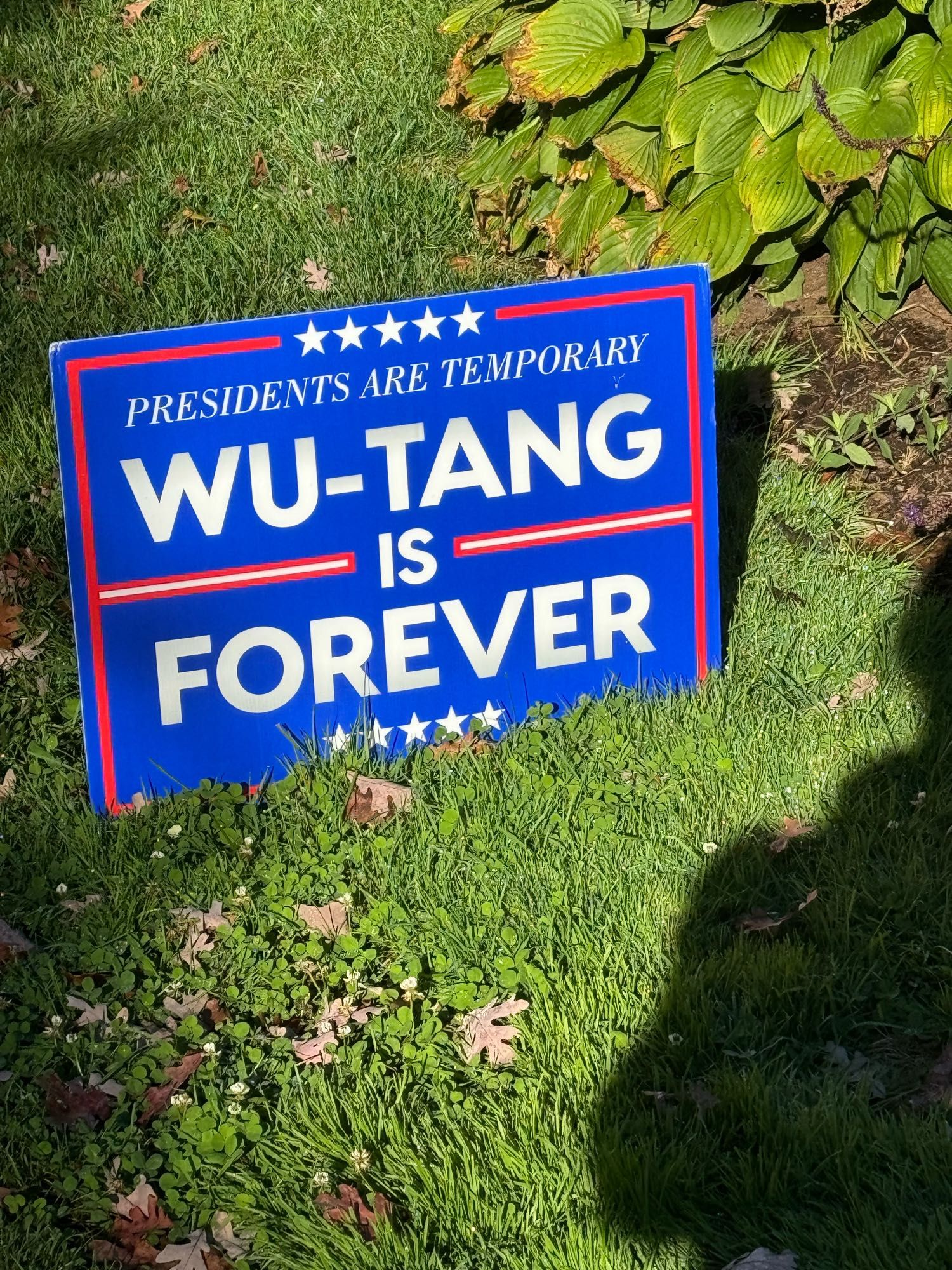 political lawn sign that reads: “Presidents are Temporary — Wu-Tand is Forever”