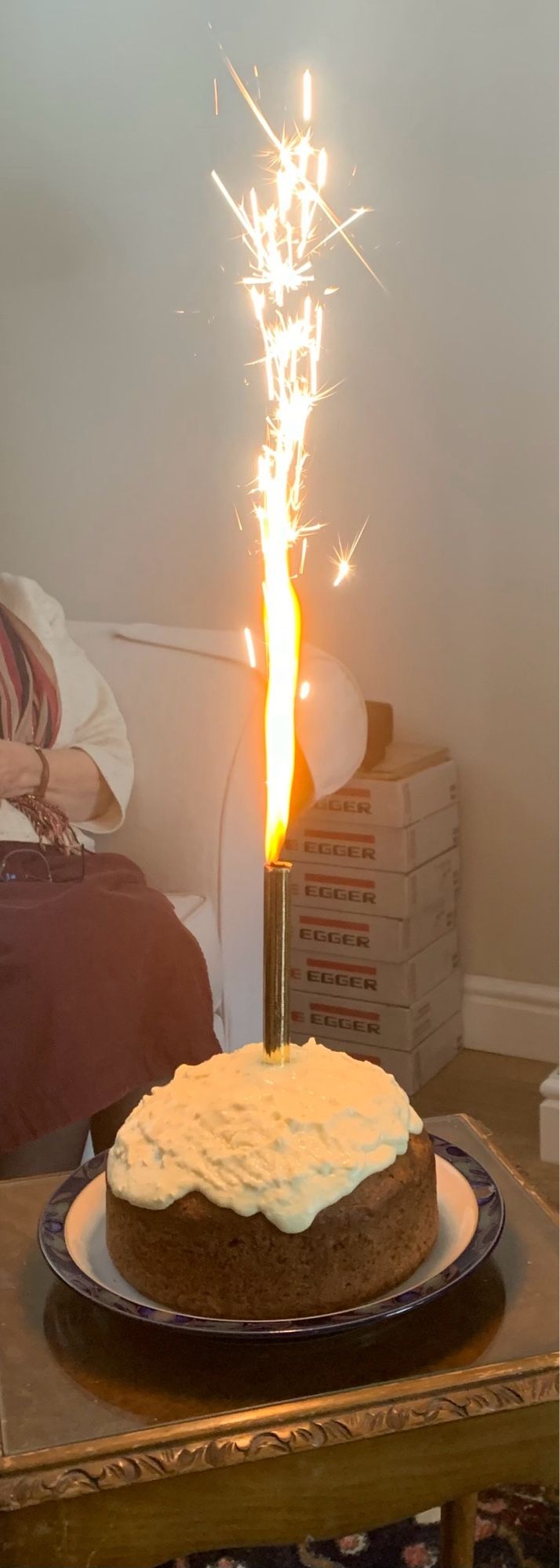 Home made carrot cake with a 2 foot flame on a sparkler candle