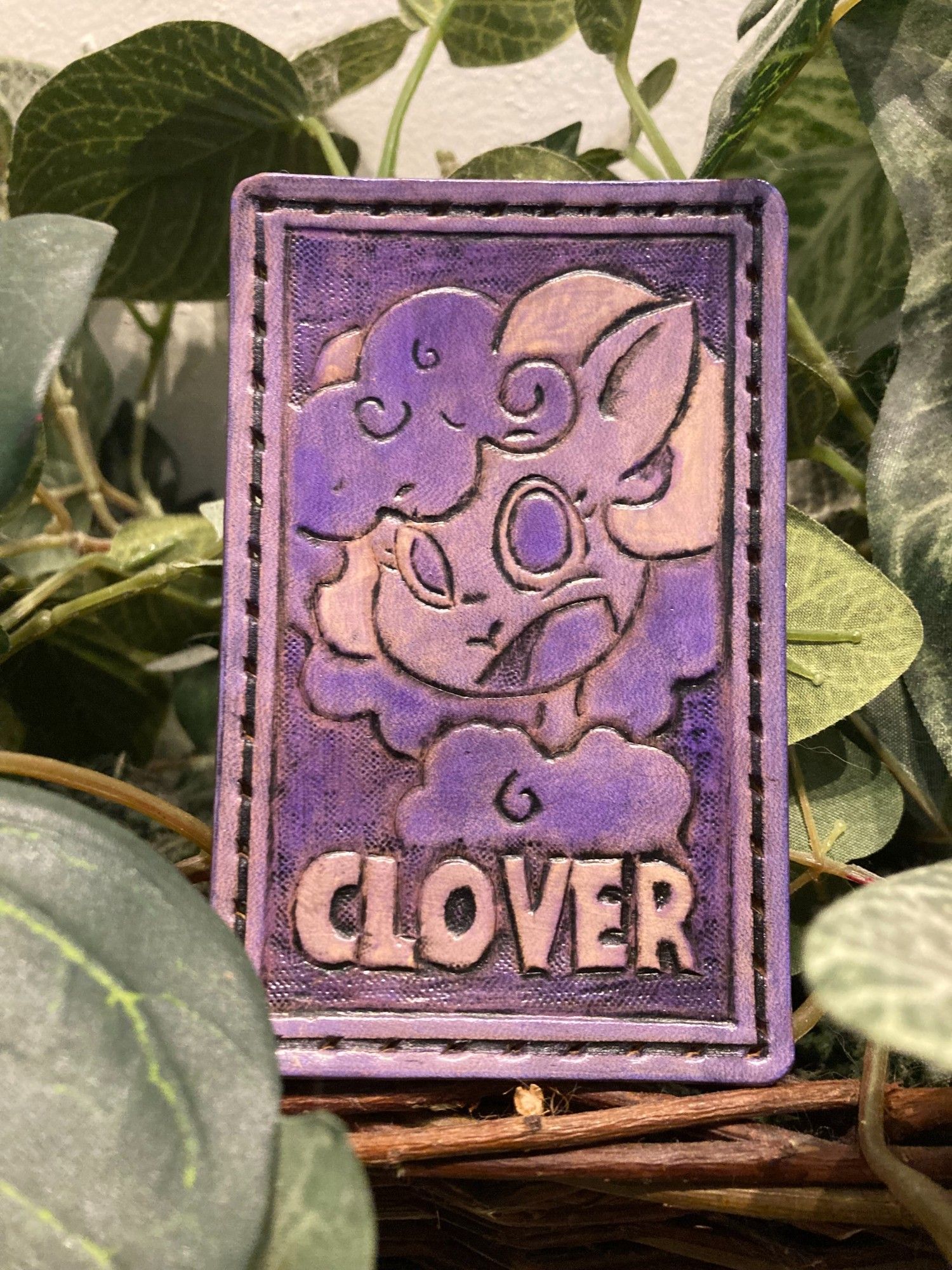 Purple leather patch featuring a sheep and the text "CLOVER"