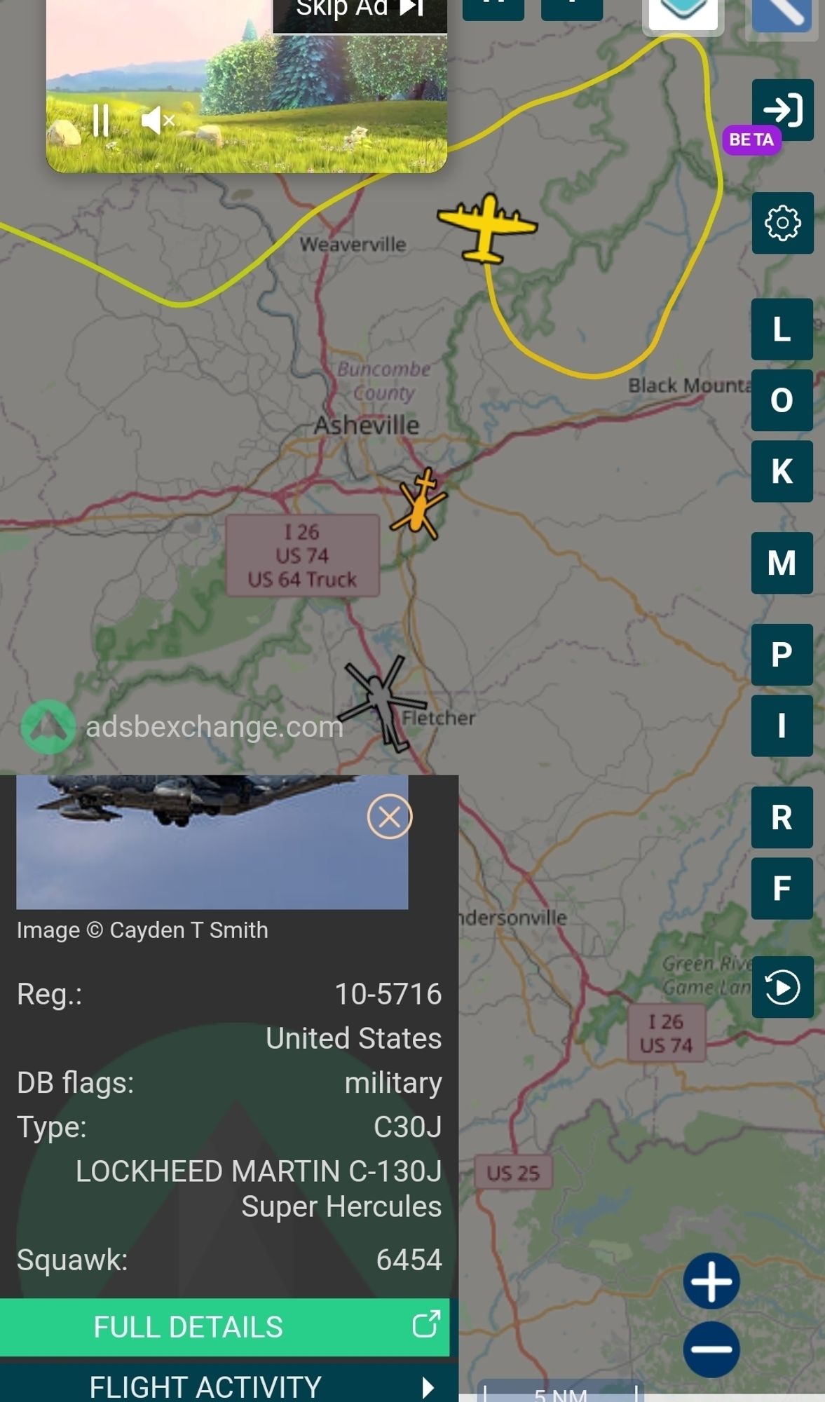 Flight tracker zoomed in on Asheville. A Super Stallion is shown in gray. A Super Hercules and it's track in yellow is to the north. A smaller helo in orange is between the Super Stallion and the Hercules.