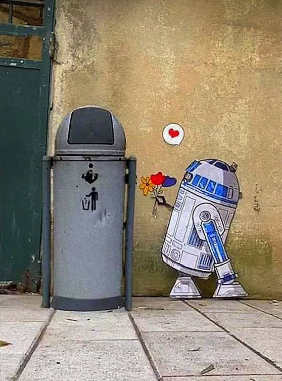 Graffiti : r2d2 amoureux d’une poubelle 