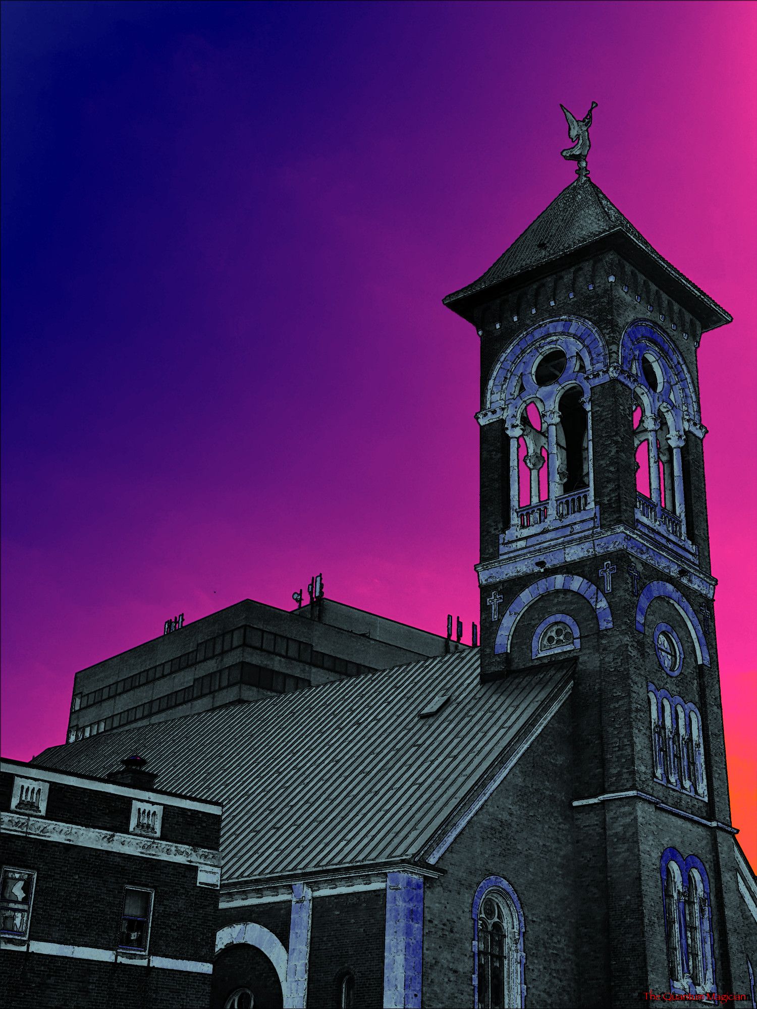 A church steeple above a church roof, the top of an office building slightly visible behind it, and another to the left beside it.

The picture has been run through home brew image processing software which has manipulated the colors and outlined details in black.

The buildings are mostly charcoal gray with some purple tinting. The sky is an orange and magenta aura around the buildings, fading to purple above and the left.