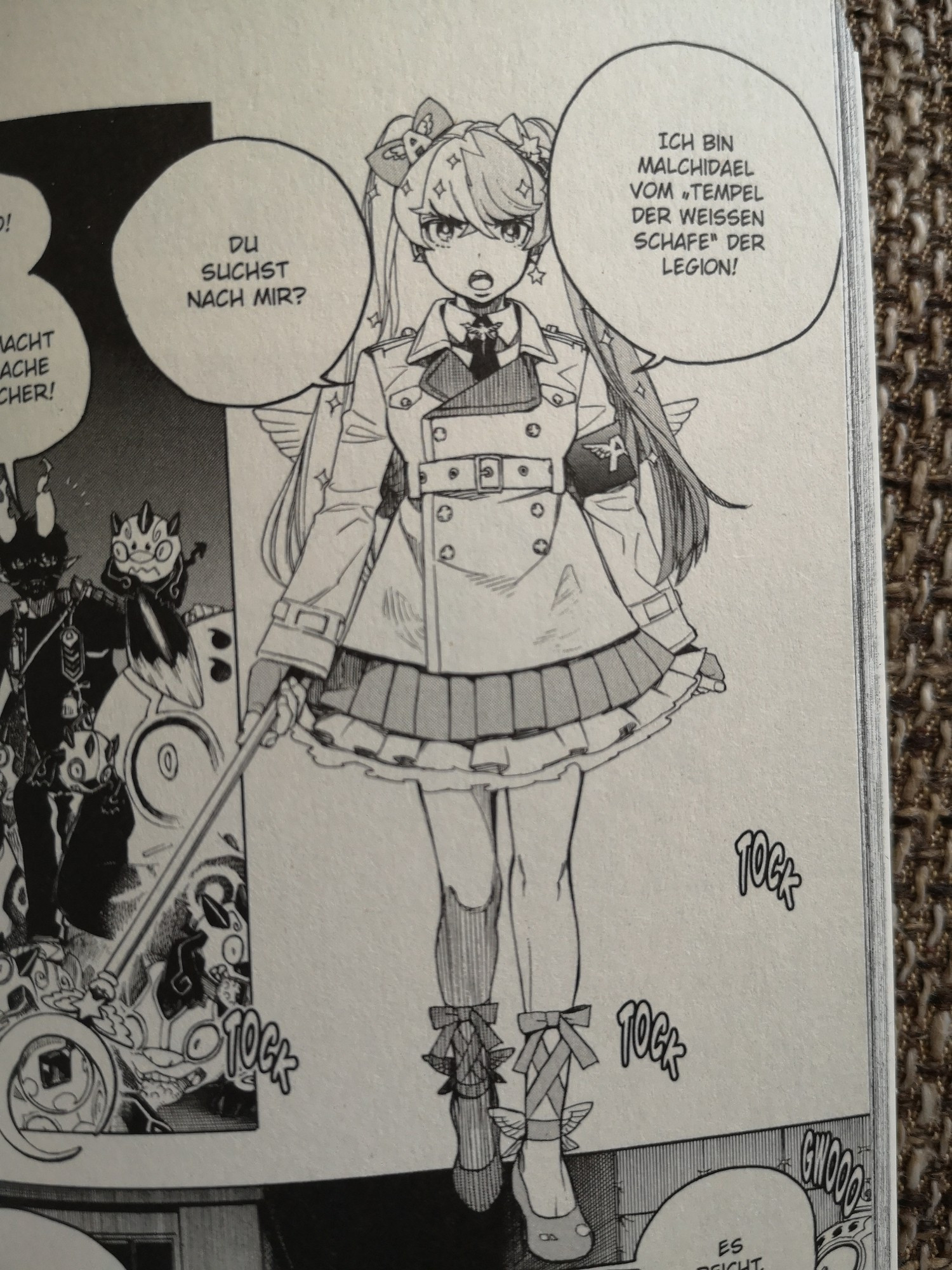 Picture of a panel from the Manga blue exorcist, Vol. 29. A new character who looks like a crossover with sailor moon. Or pretty cure. Just like a magical girl.