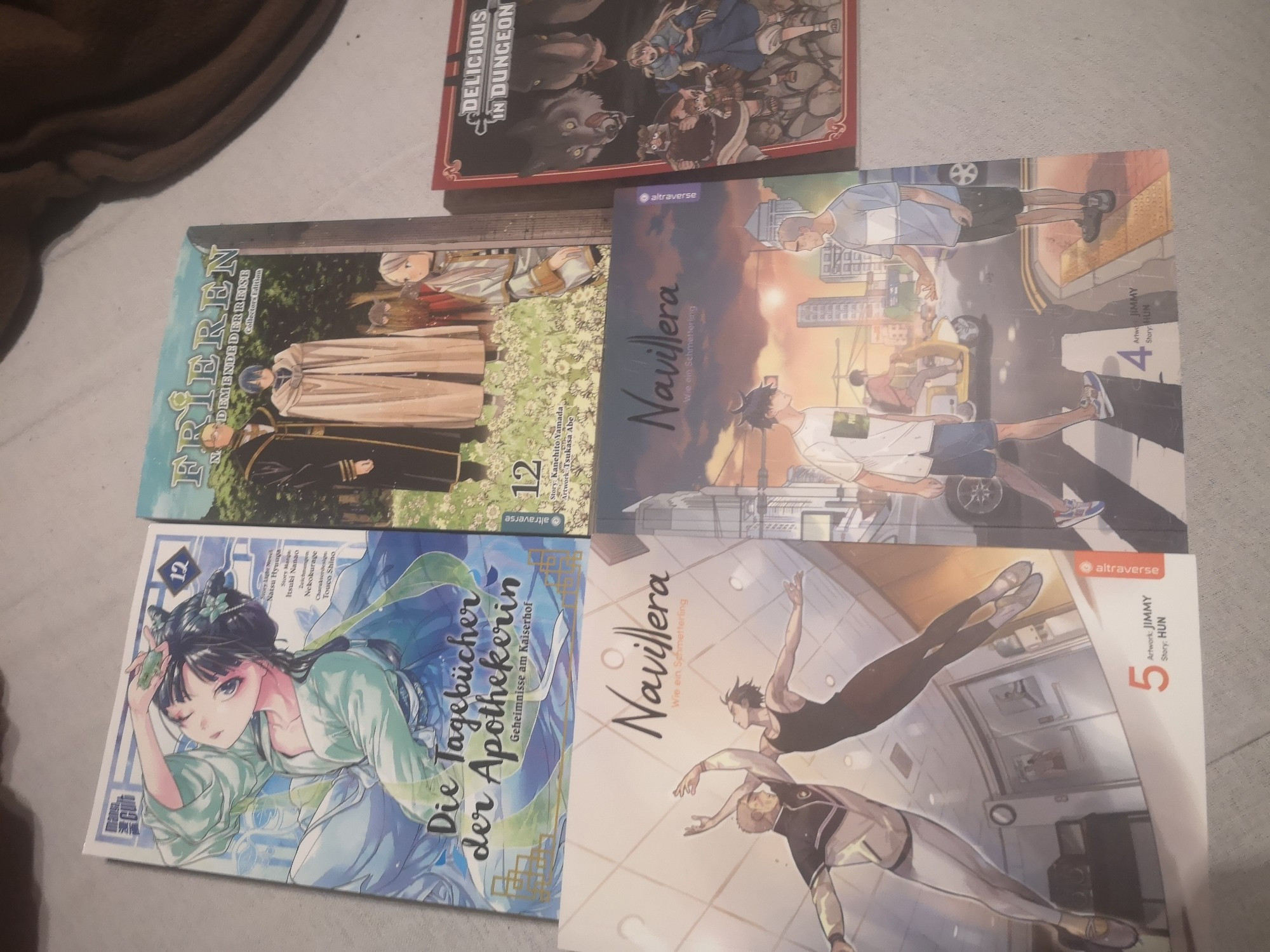 Pictures of five Manga.
- Frieren Vol. 12
- Tagebücher der Apothekerin Vol 12
- Delicious in dungeon Vol. 13
- Navillera Vol 4 and 5