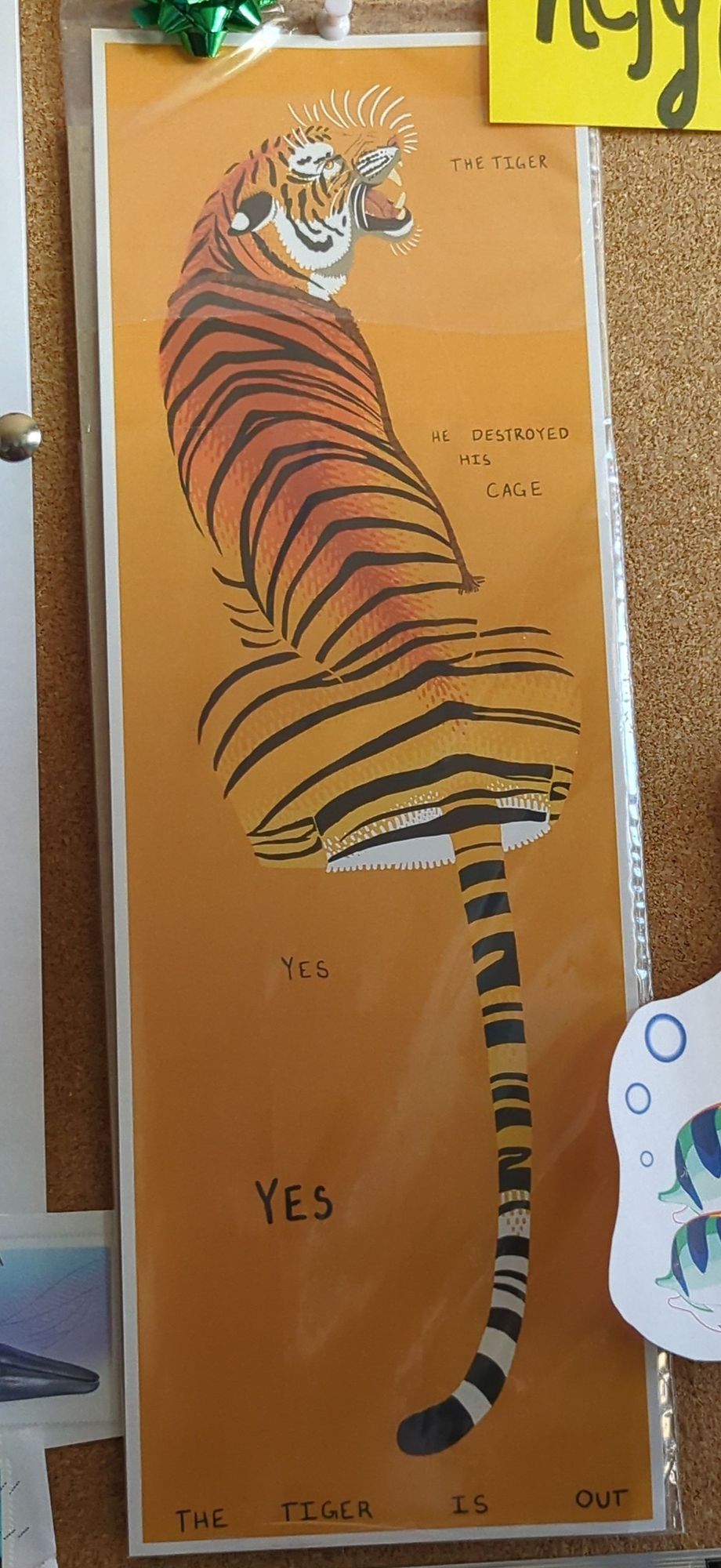 A tall, narrow print of a roaring tiger wearing a broken rope around her neck, seen from the back, on an orange background. Written around the tiger is the poem The Tiger by Nael, age 6

The tiger
He destroyed his cage
Yes
YES
The tiger is out