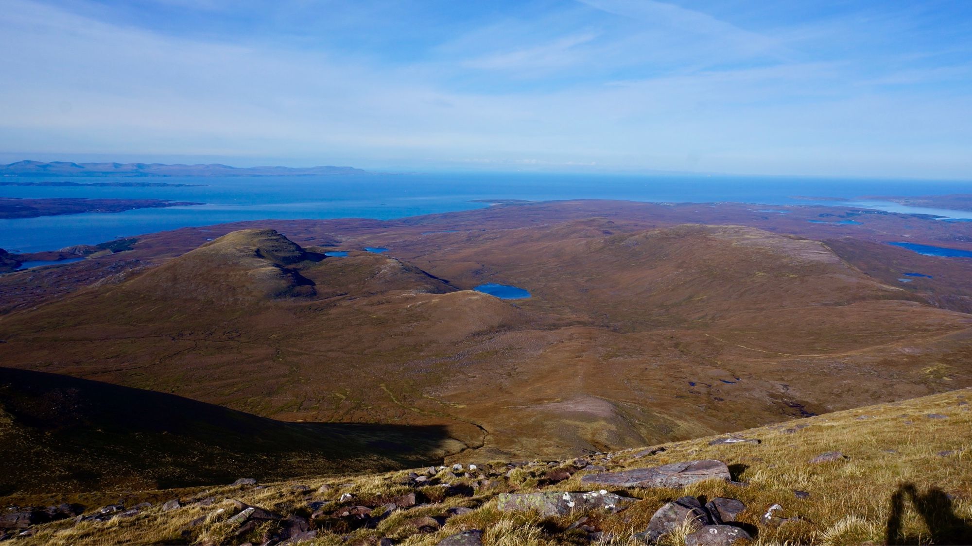 Looking north-west over to Skye (on the left) and the Western Isles - Harris and Lewis specifically (in the hazy distance