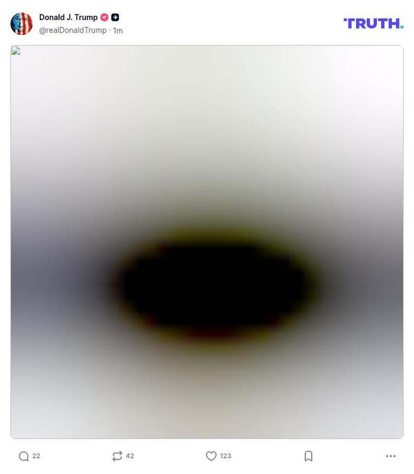An archived screencap of a deleted Truth Social post of Trump's, showing a black oval with blurry edges in the center of a grayish field.