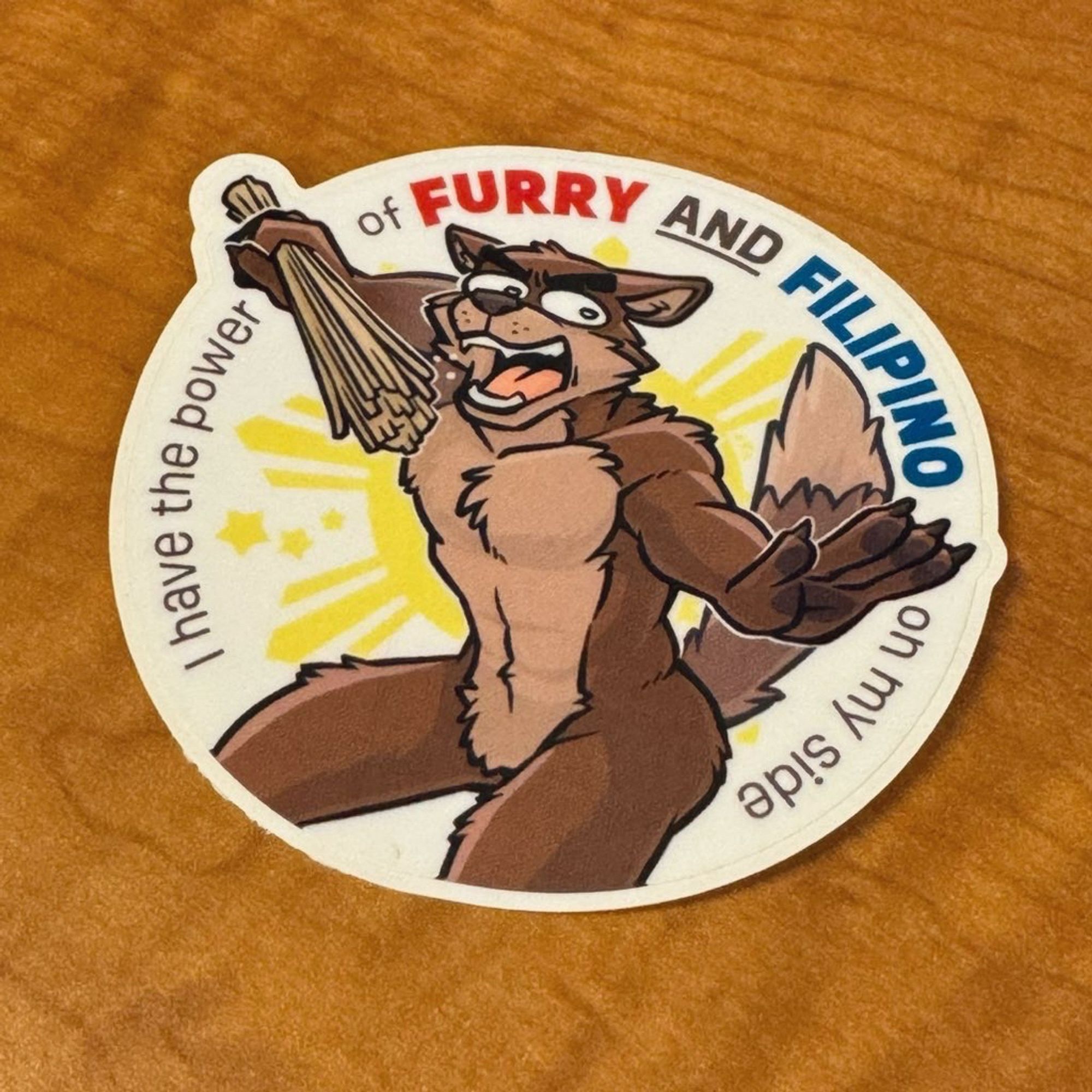 a sticker of an anthro wolf holding a walis in front of the sun saying “I have the power of FURRY AND FILIPINO on my side”