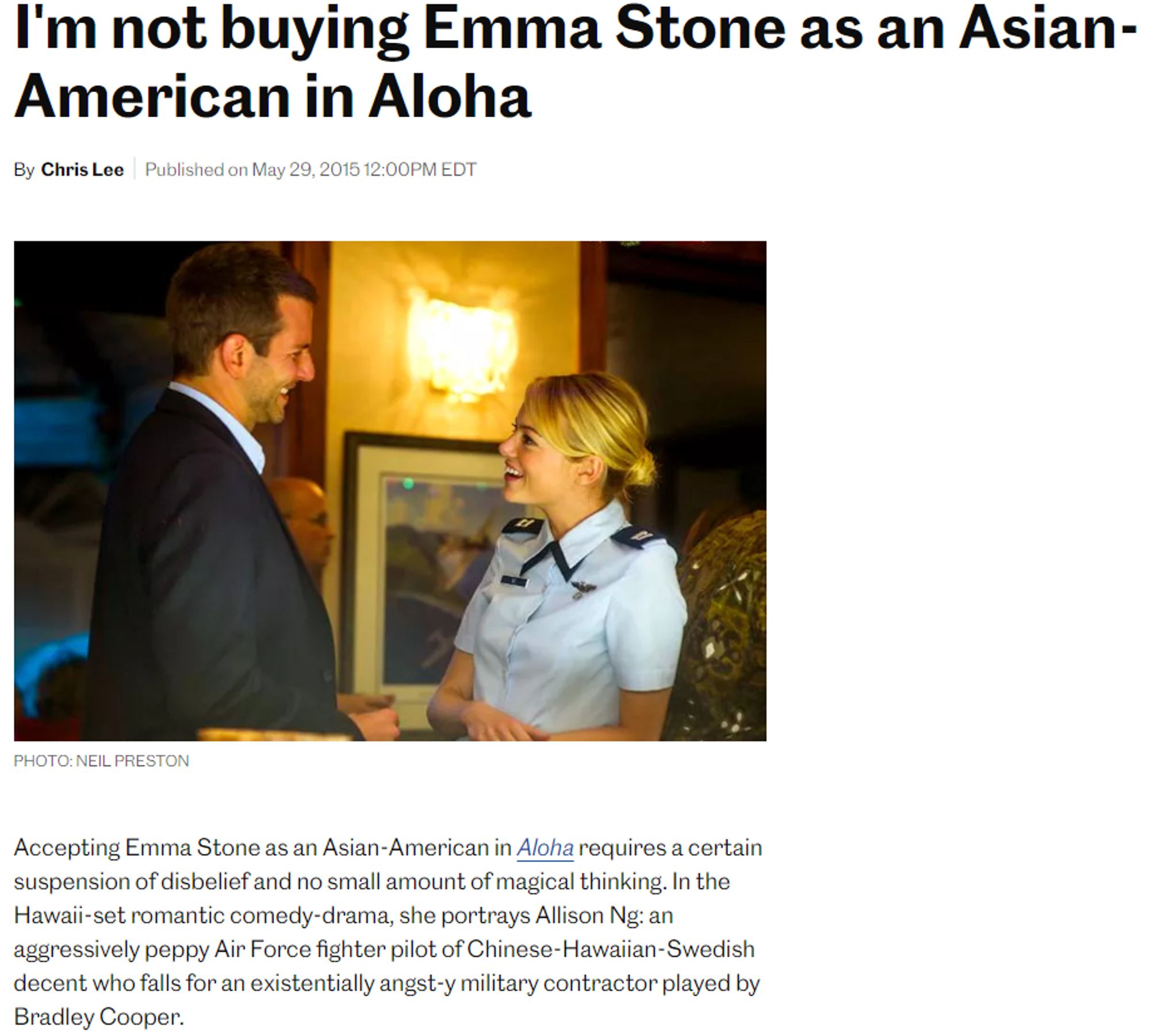 Screenshot of an Entertainment Weekly article from 2015 titled "I'm not buying Emma Stone as an Asian-American in Aloha" by Chris Lee.

The text reads:
"Accepting Emma Stone as an Asian-American in Aloha requires a certain suspension of disbelief and no small amount of magical thinking. In the Hawaii-set romantic comedy-drama, she portrays Allison Ng: an aggressively peppy Air Force fighter pilot of Chinese-Hawaiian-Swedish decent who falls for an existentially angst-y military contractor played by Bradley Cooper."