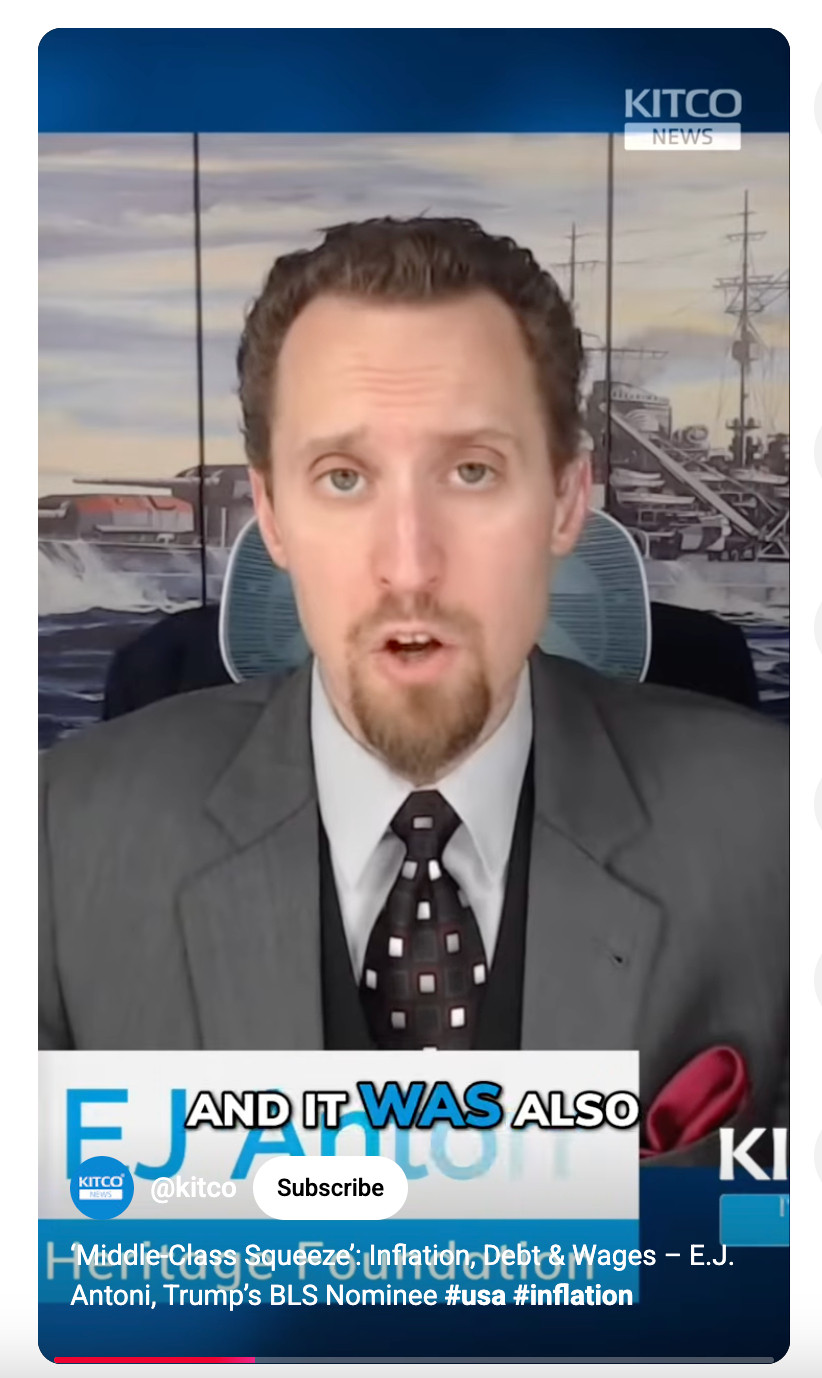 YouTube screenshot of EJ Antoni doing an interview with @kitco, where he has Nazi battleship art on his wall. 