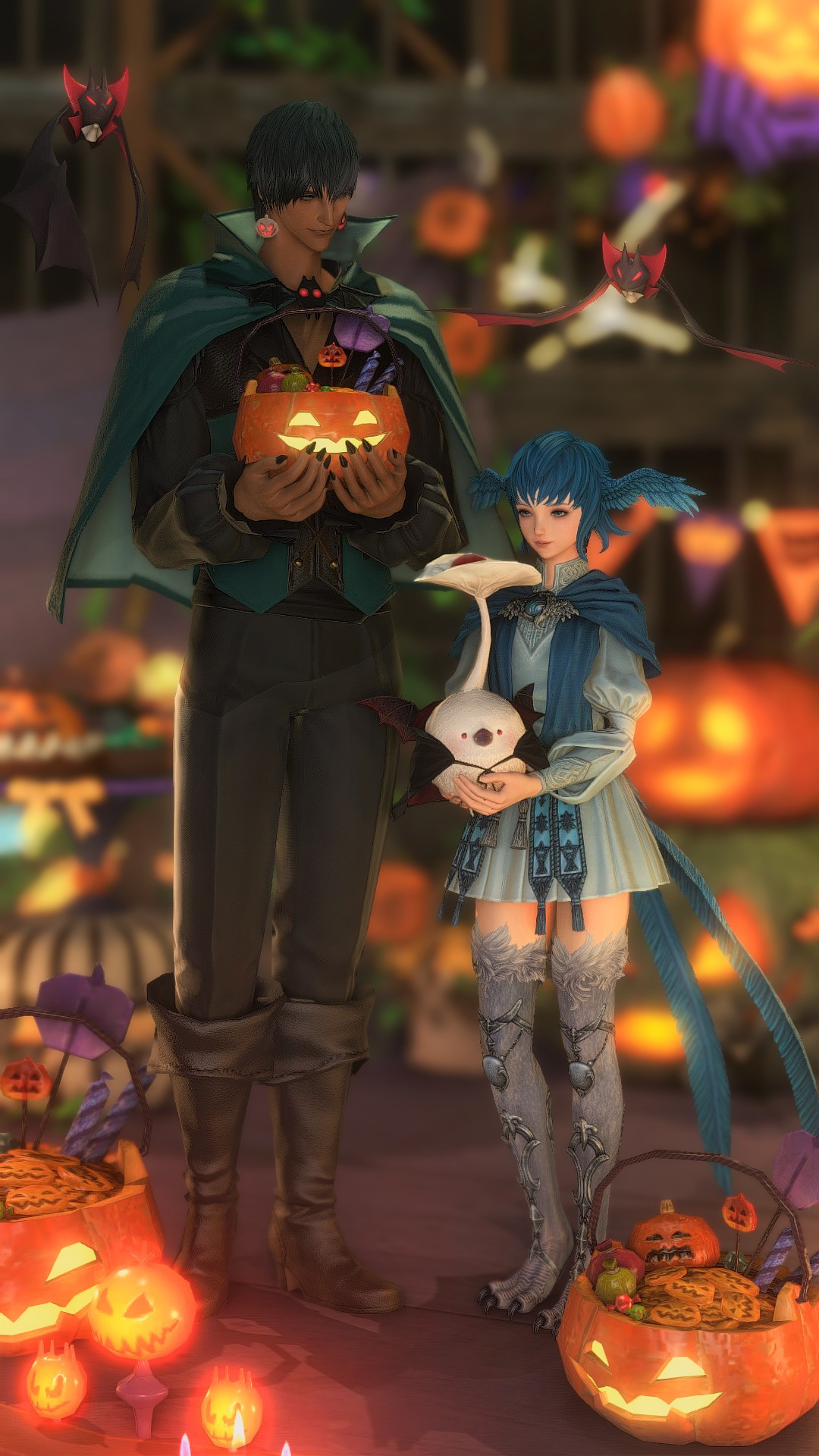 A screenshot of two characters from FFXIV, Hermes and Meteion. They are standing next to each other in a Halloween-themed set-up. Hermes is wearing a vampire costume and holding a jack-o'-lantern shaped bucket filled with sweets. Meteion is holding a white korpokkur minion in a vampire costume. Two bats are flying above them.