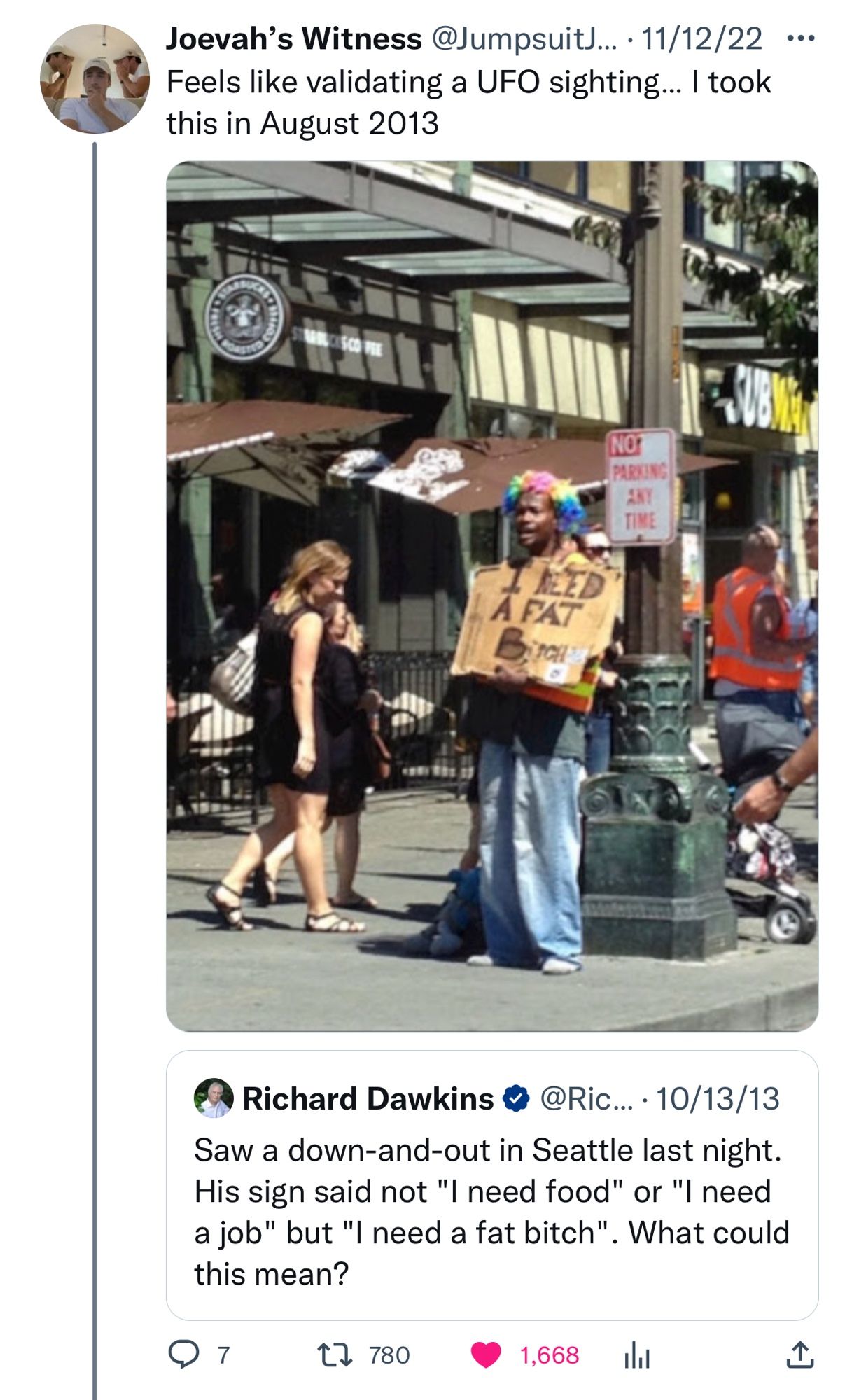 Quote tweet of the above Richard Dawkins tweet with “Feels like validating a UFO sighting... I took this in August 2013” with a street photo of a panhandler holding a sign saying “I need a fat bitch” 