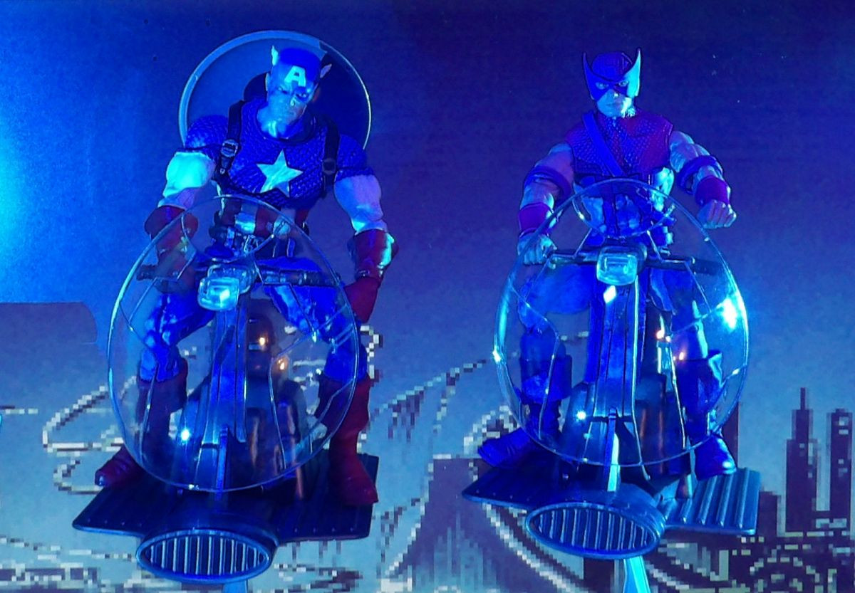 Marvel Legends Captain America and Hawkeye on Sky-Cycles in front of a background from Data East's Captain America and the Avengers