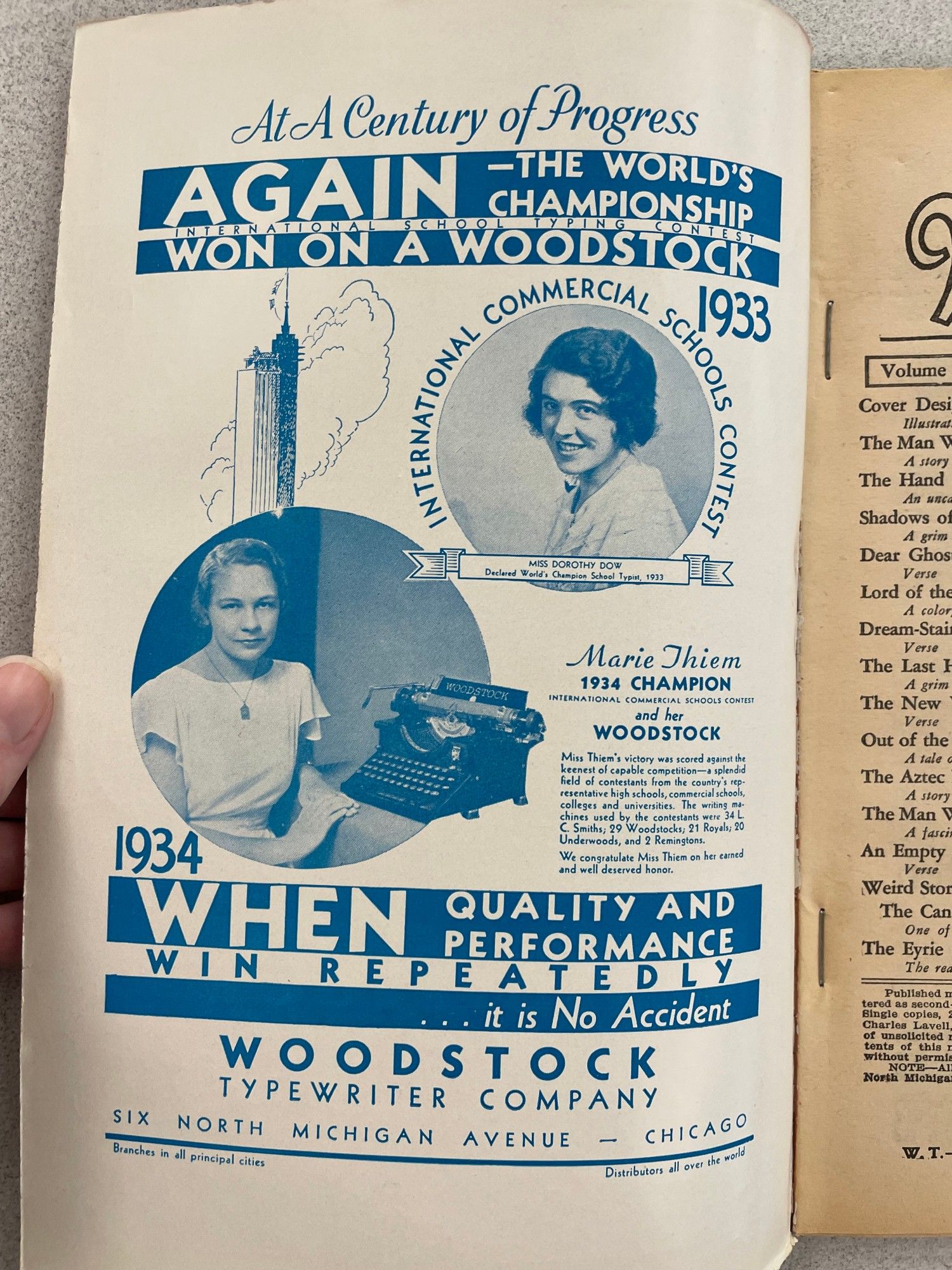 Ad for Woodstock typewriters featuring two winners of a typewriting competition.