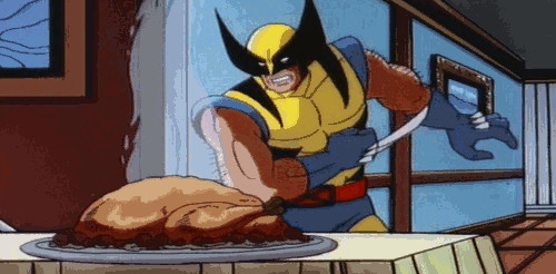 Wolverine in his yellow outfit with mask on uses his adamantium claws to slice a leg off a Thanksgiving turkey.