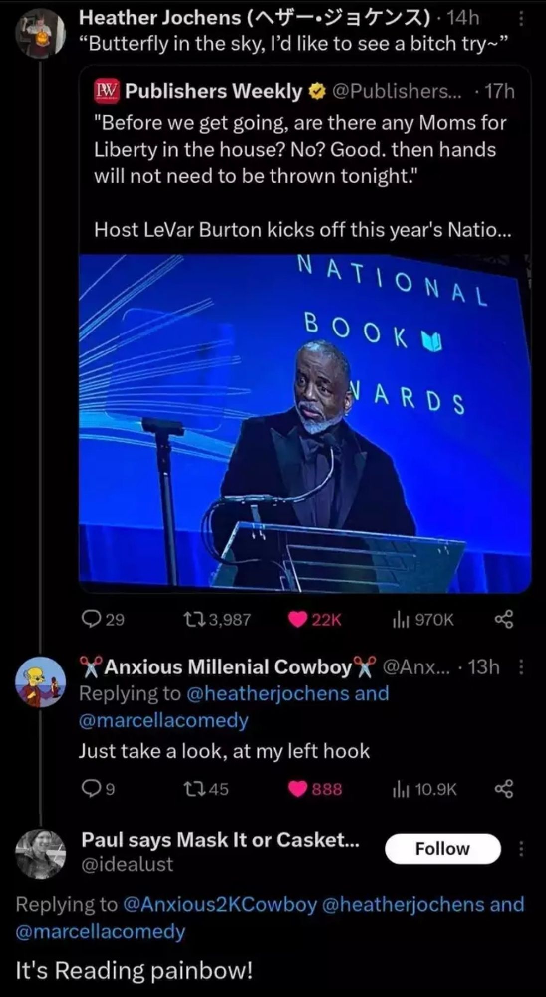 screenshot of tweets with another screenshot from the National Book Awards. The host, LeVar Burton is quoted "before we get started, are there any Moms for Libery in the house? No? Good, then hands will not need to be thrown tonight." There are additional replies in the thread including "Butterfly in the sky, I'd like to see a bitch try." "Just take a look, at my left hook." "It's reading Painbow!"