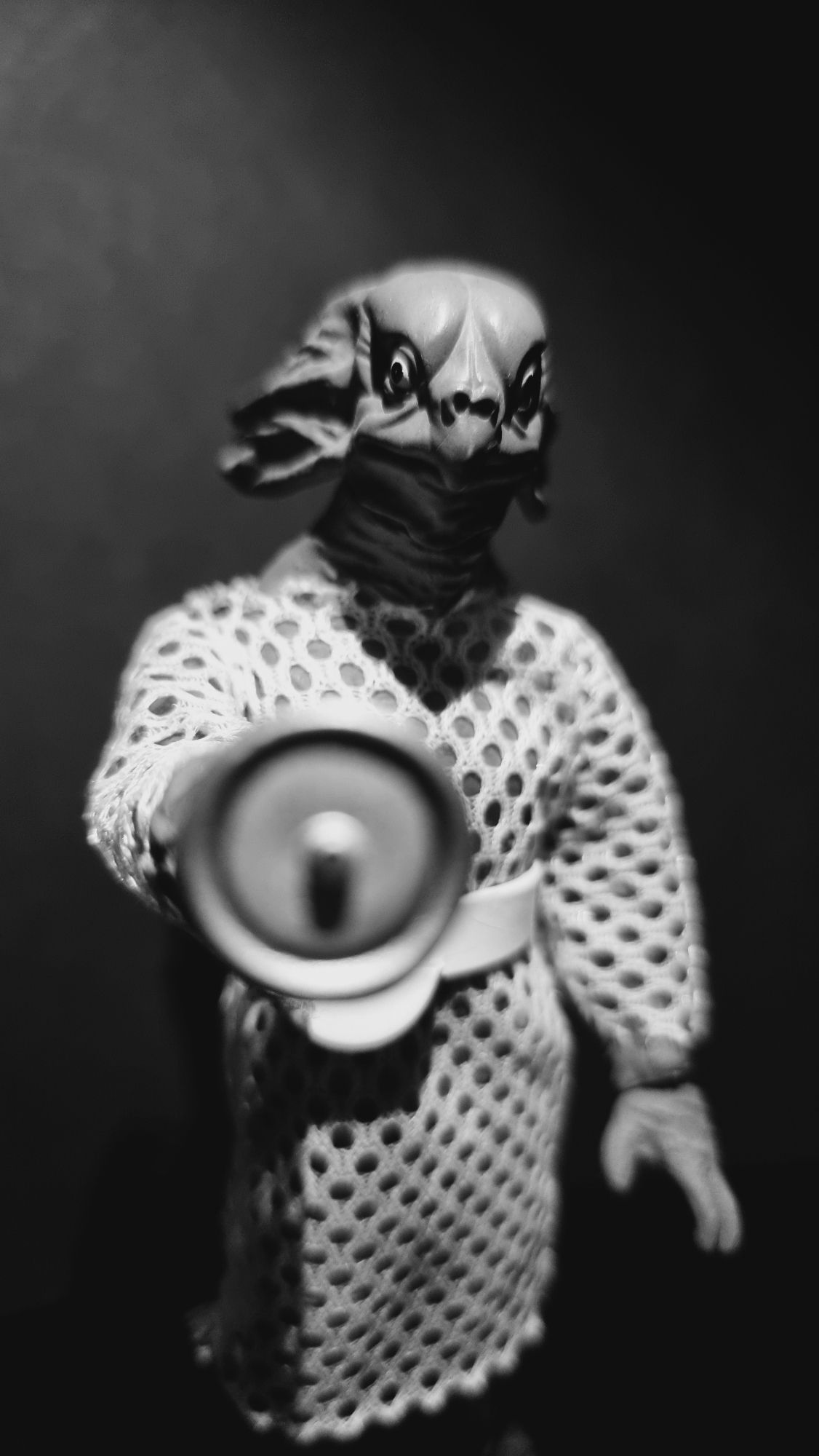 A B/W picture of a character options Sea Devil Action figure.