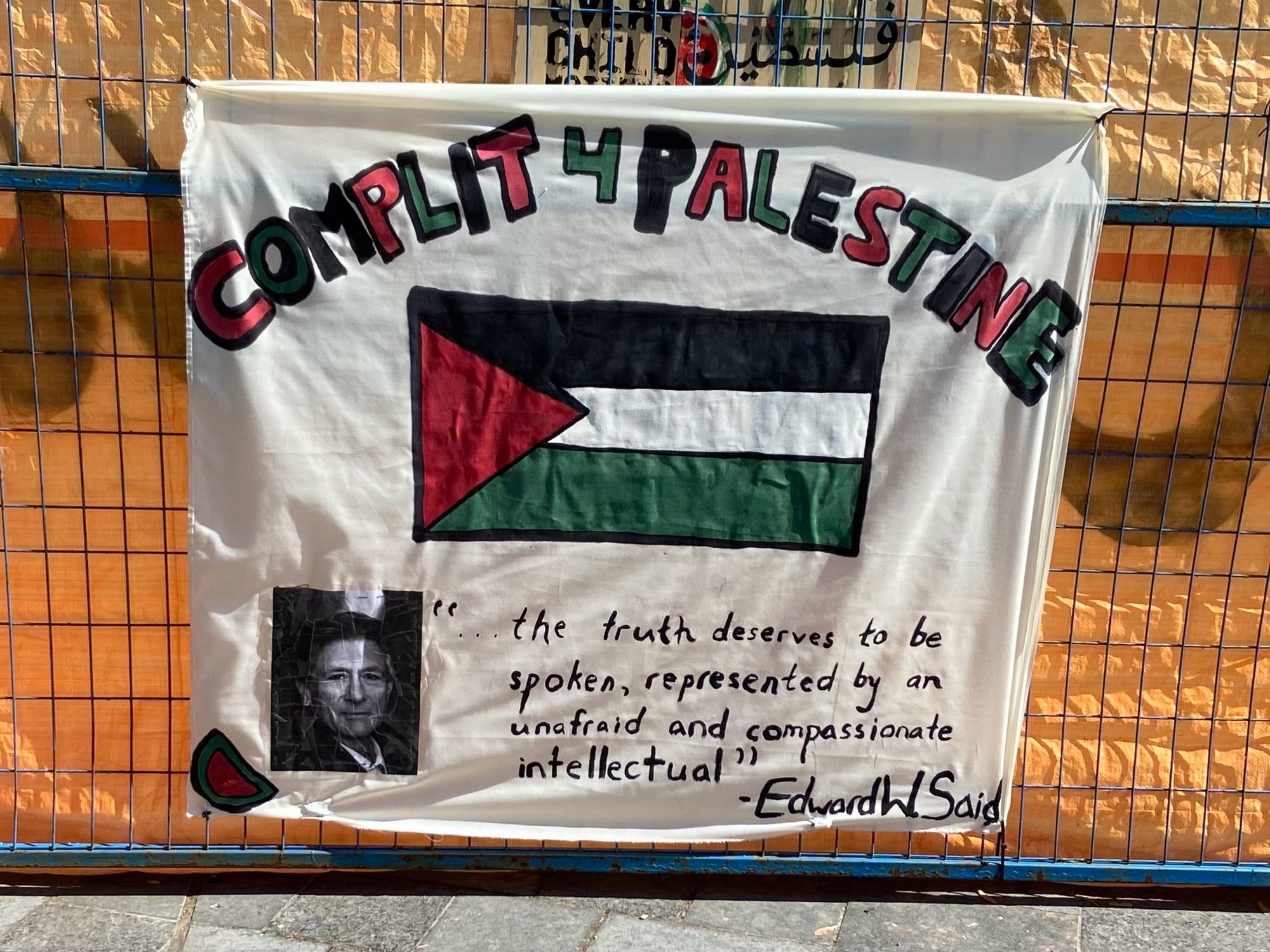 Banner that says “Complit for Palestine” with a Palestinian flag and a picture of Edward Said, and a quotation: “the truth deserves to be spoken, represented by an unafraid and compassionate intellectual”