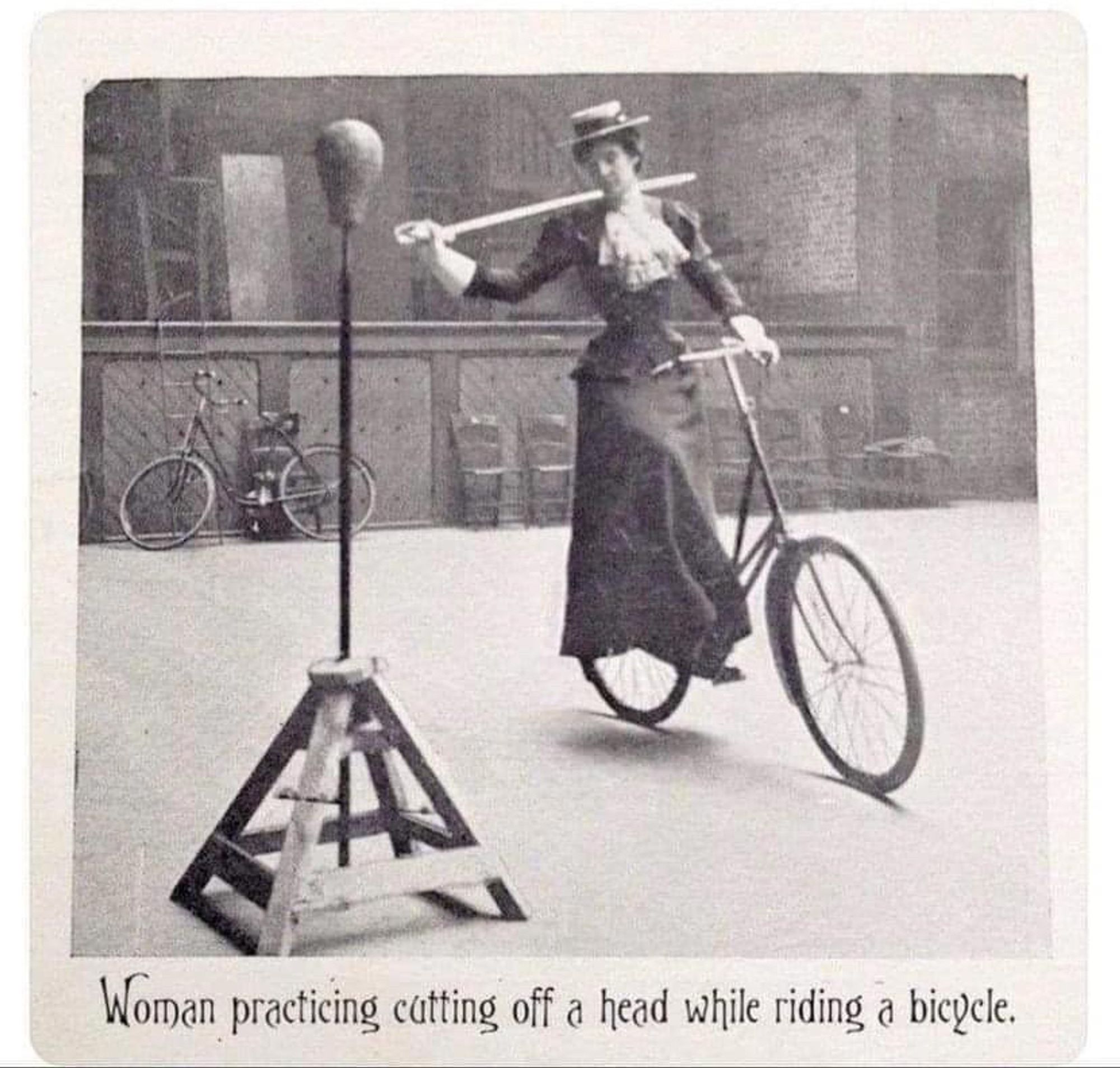 A picture of a woman on a bicycle with a sword with the caption "Woman practicing cutting off a head while riding a bicycle."