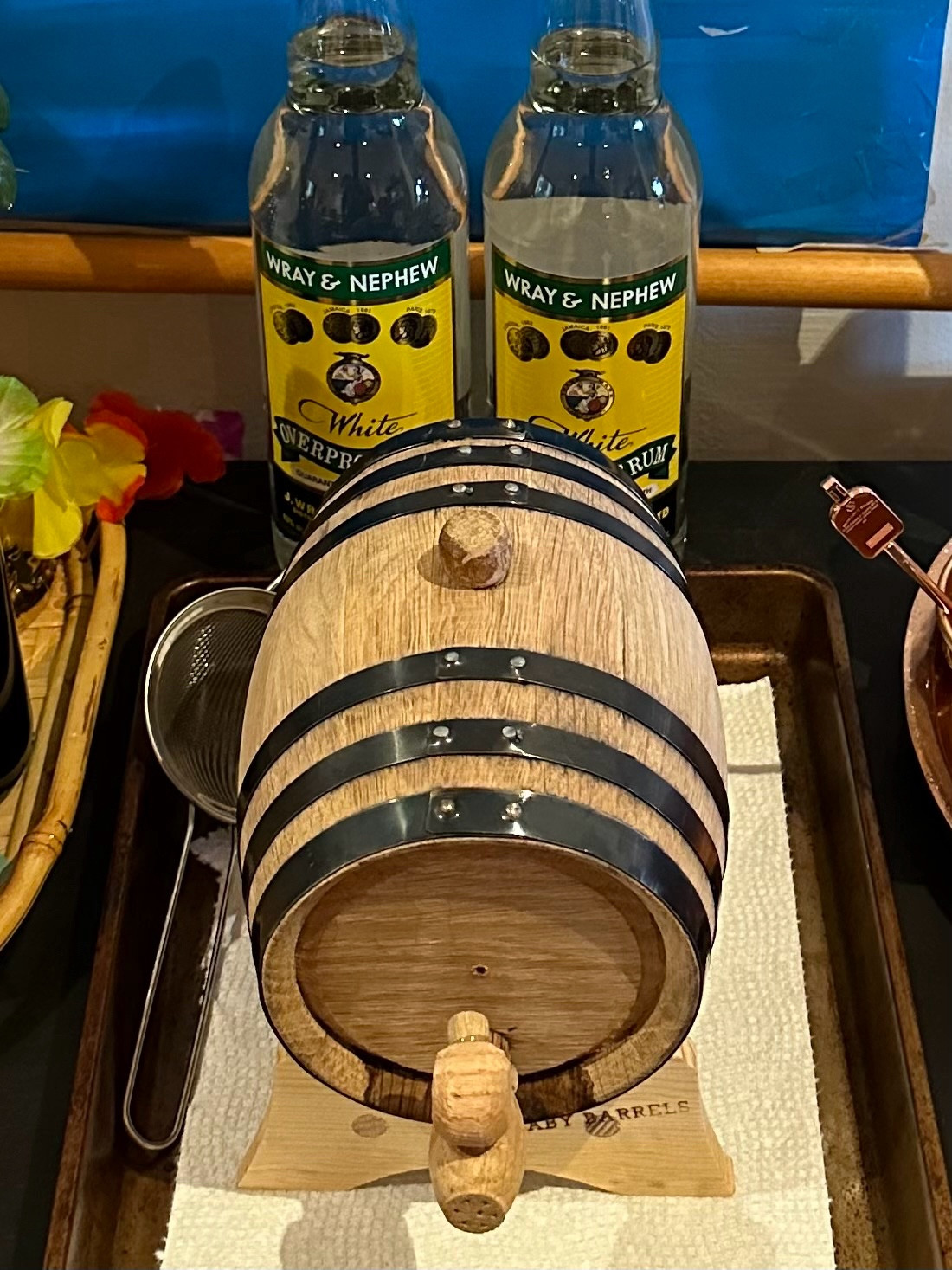 Mini barrel curing (filled with water) and two bottles of Wray & Nephew Overproof rum