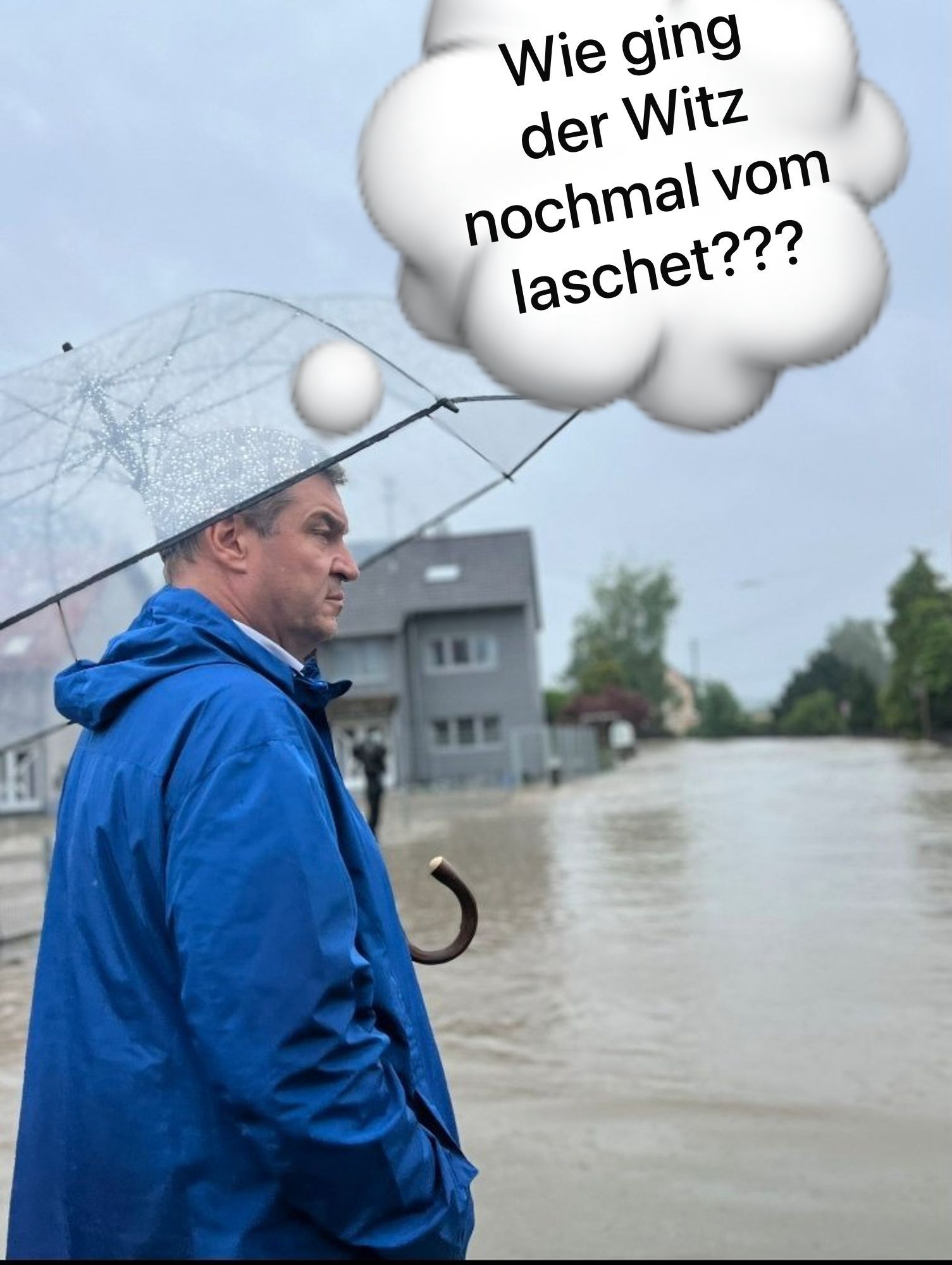 Söder sieht eine überschwemmte Straße und überlegt wie der Witz damals ging den Laschet damals erzählt bekommen hatte.