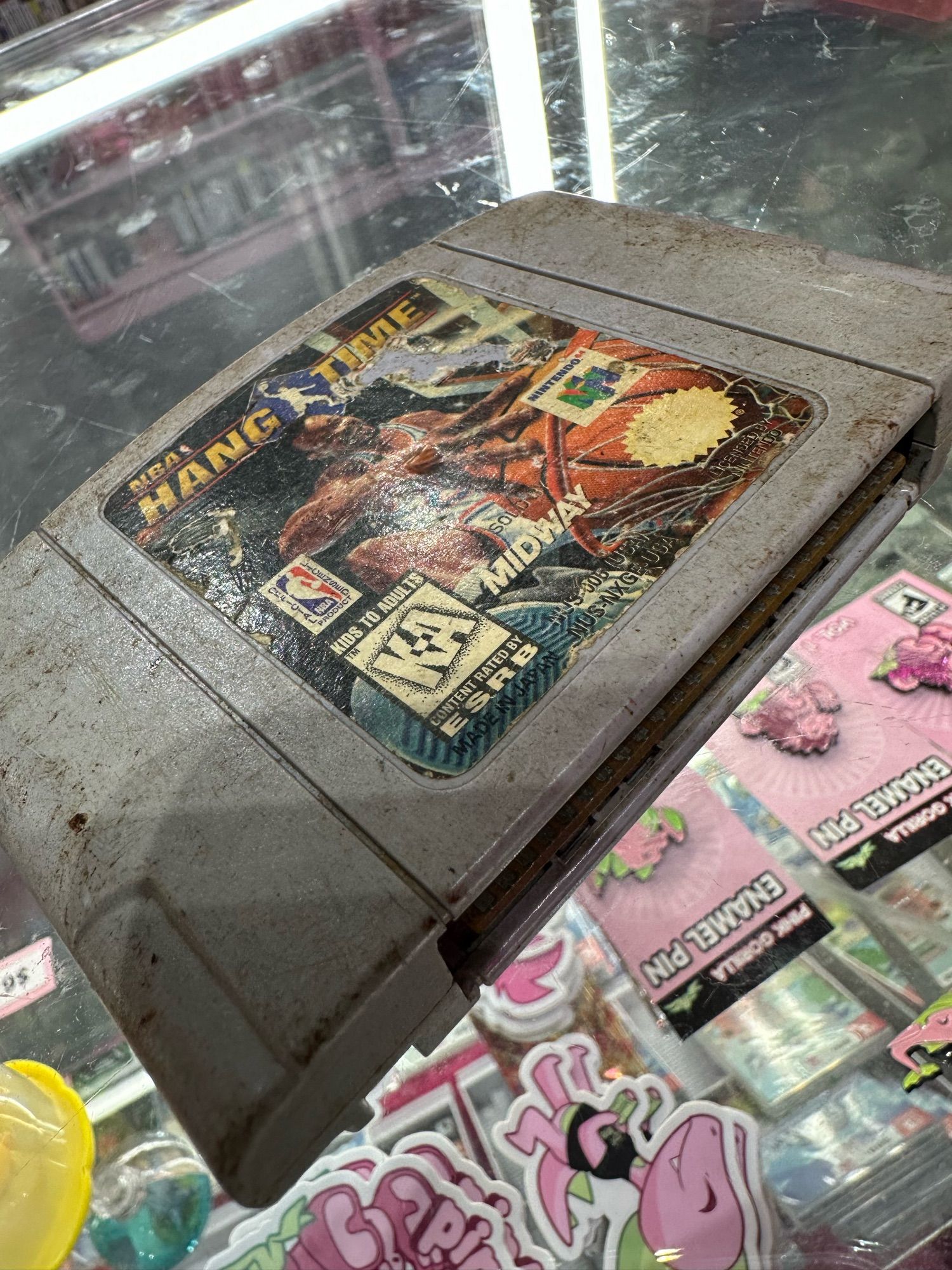 an copy of NBA hangtime for N64 absolutely covered in dirt and filth