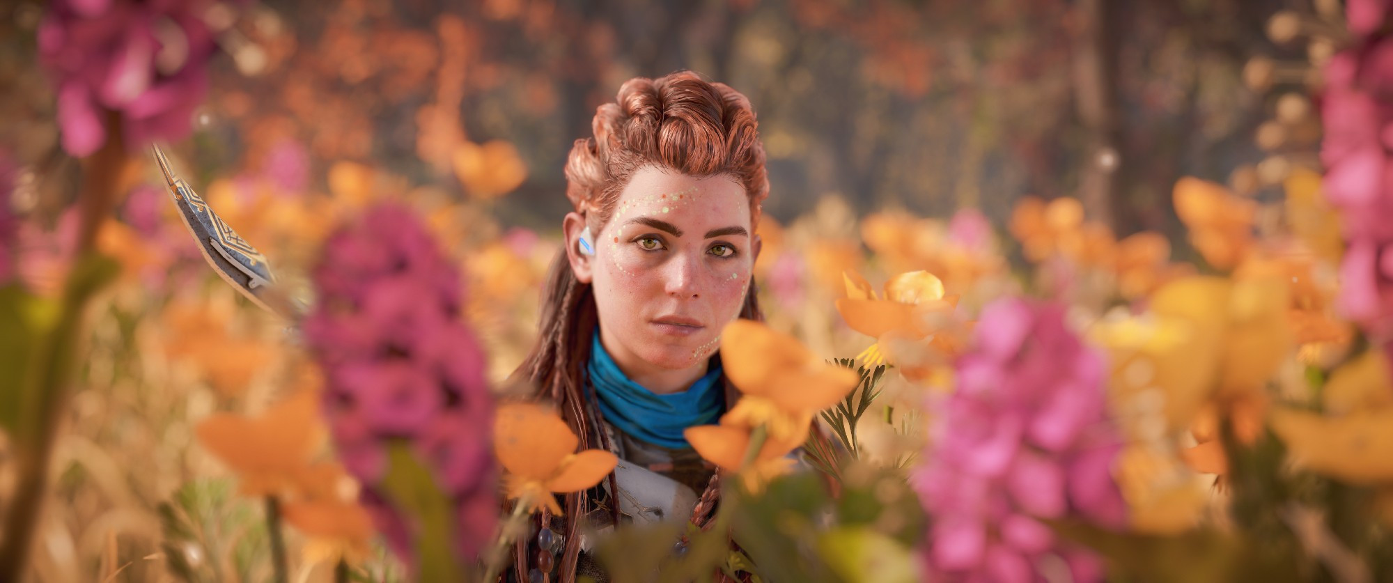 Aloy sits in Flowers 