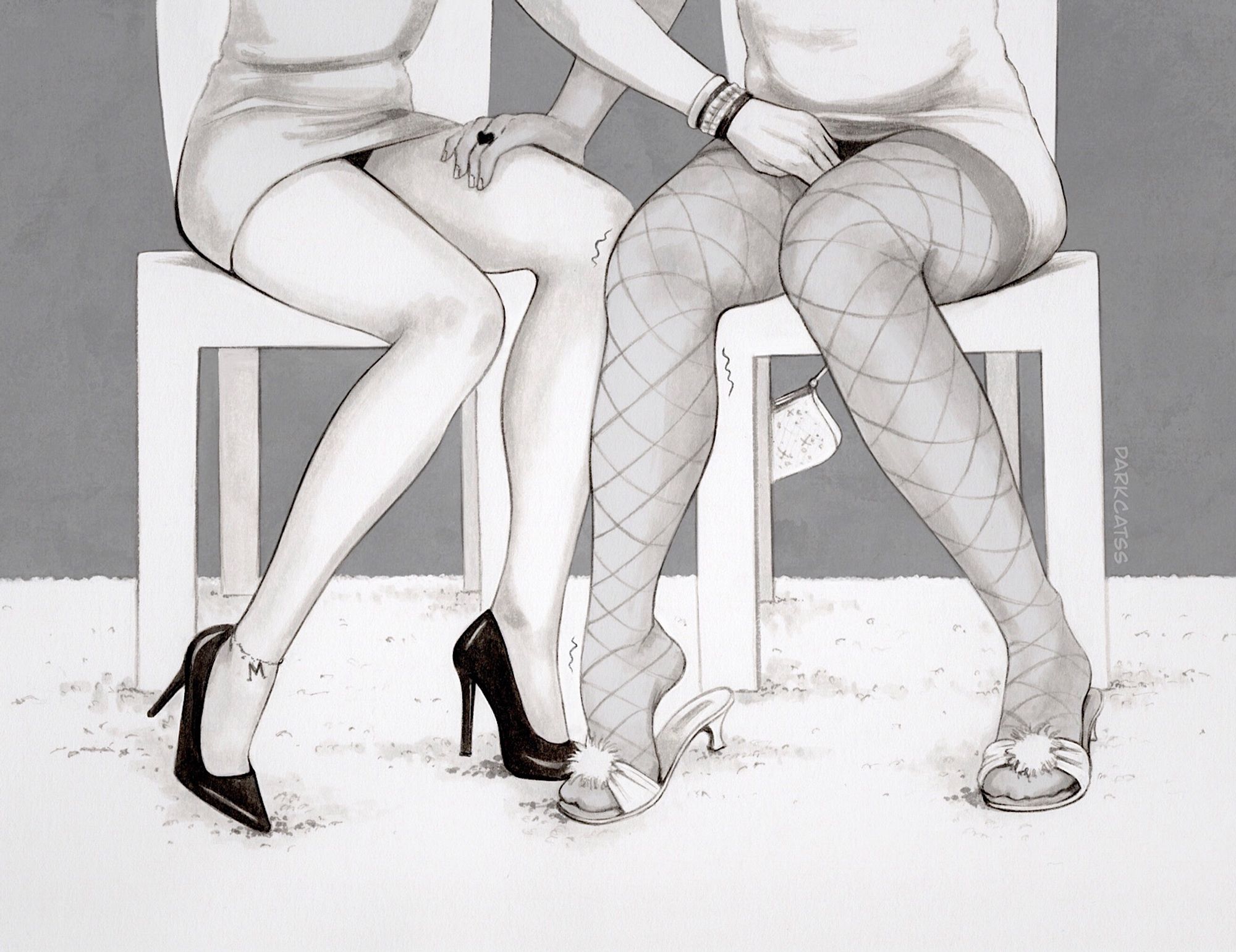 Two sets of lady legs in heels from under-the-table perspective.