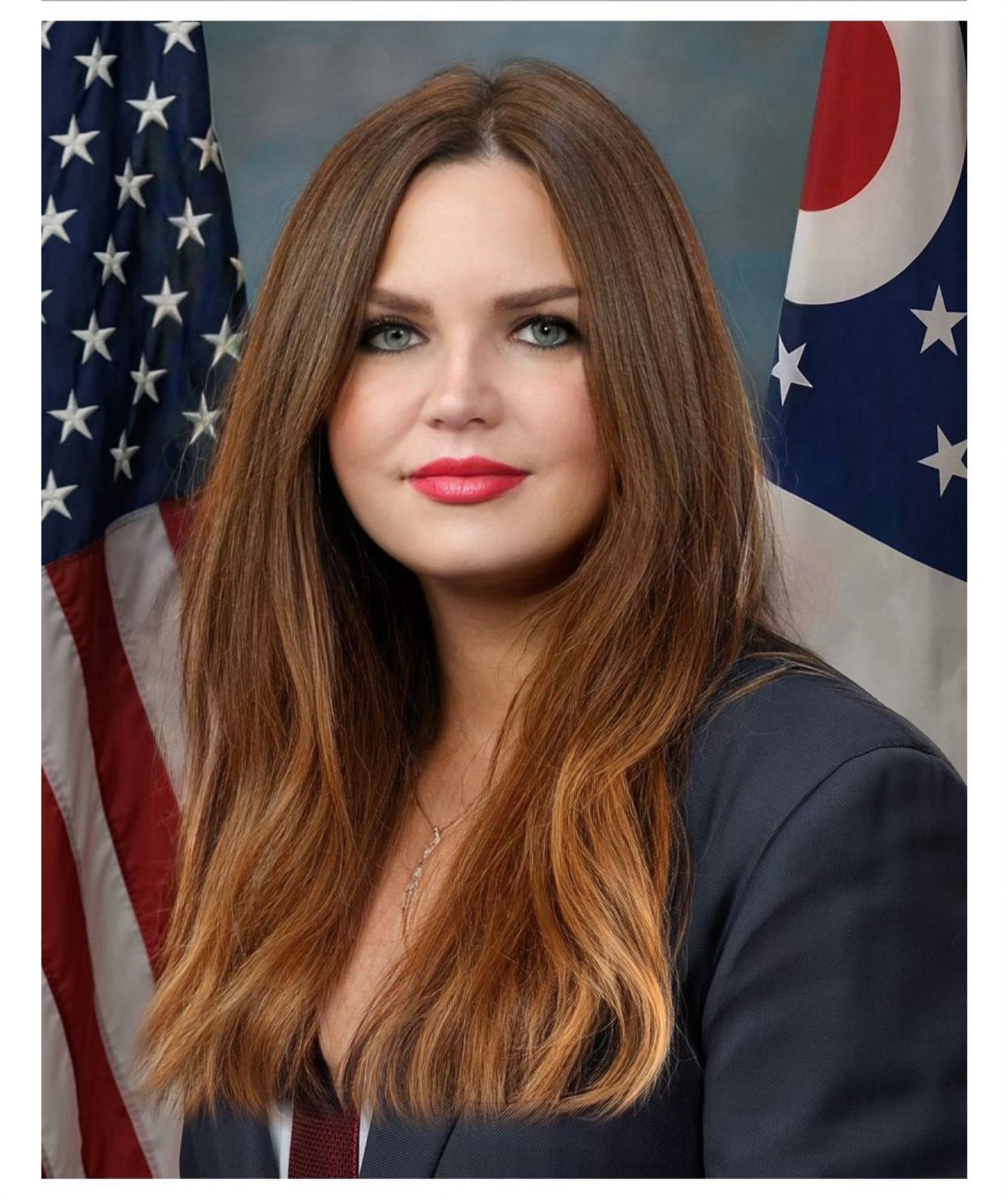 Doctored photo of JD Vance as a woman with long brown hair and red lipstick