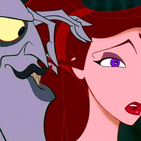 hades whispering something in meg's ear from the hercules animated movie