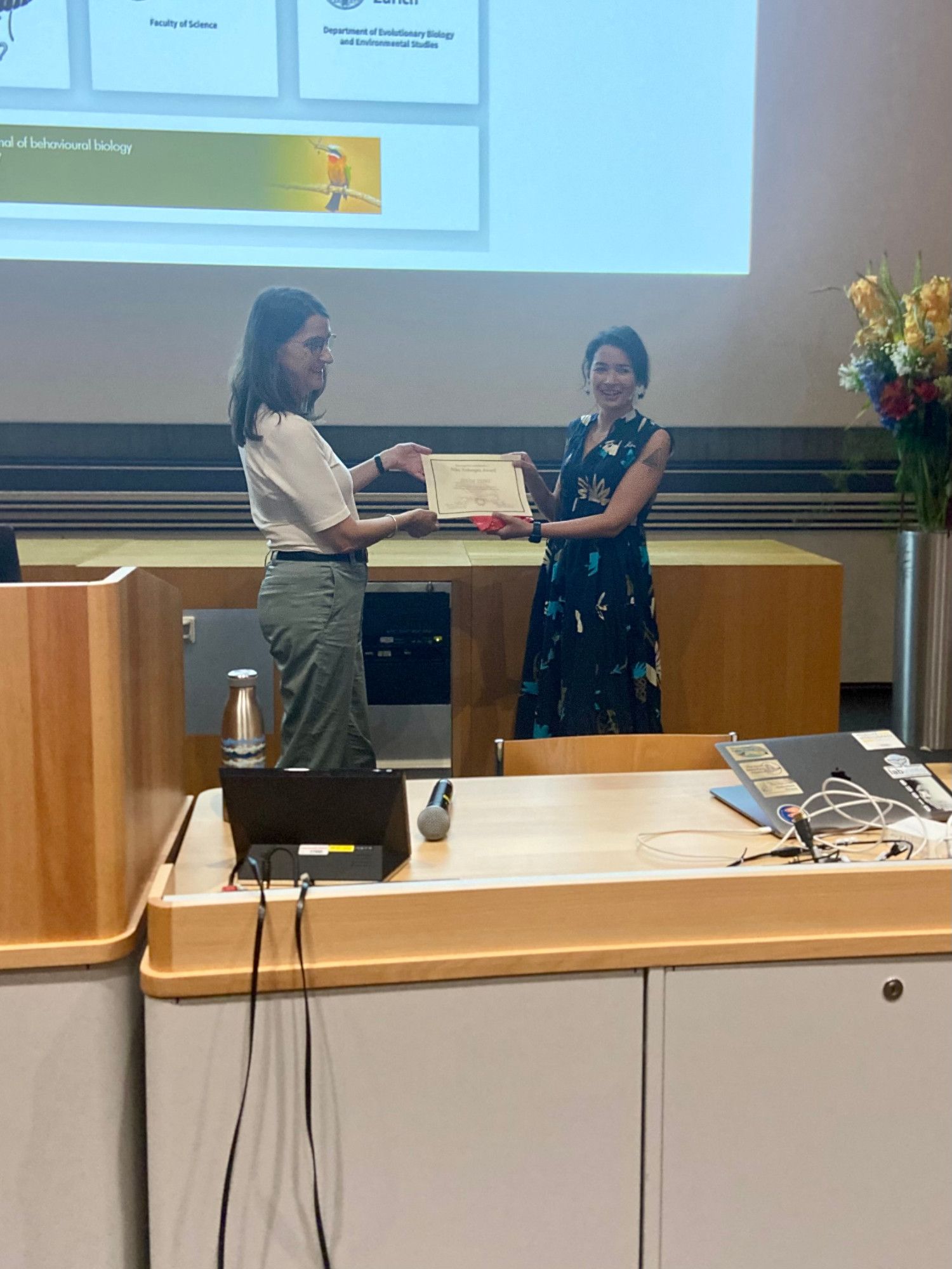 Zegni Triki receiving the Ethoges award certificate