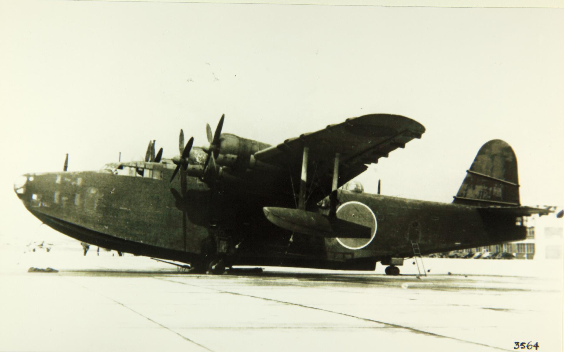 The Kawanishi H8K was designed as a replacement for the Kawanishi H6K, which entered service in 1938. The Imperial Japanese Navy ordered the development of a larger, longer-ranged patrol aircraft under the designation Navy Experimental 13-Shi Large-size Flying Boat.

The H8K was powered by four Mitsubishi MK4Q Kasei 22 Engines giving it a maximum speed of 467 km/h (290 mph) at 5,000 m (16,000 ft). Its range was 7,152 km (4,444 miles)

The aircraft’s defensive armament was formidable, consisting of five 20mm cannons and five 7.7mm machineguns, along with the capability to carry two torpedoes or 2,000 kg of bombs or depth charges. It had a crew of ten.

Total Production was 167. The Allied reporting name for the Kawanishi H8K was Emily

The H8K entered production in 1941 and first saw operational use on the night of 4 March 1942 in a second raid on Pearl Harbor. This mission, known as Operation K, involved two H8Ks bombing Oahu, Hawaii, but due to bad weather, the mission achieved limited success. As Oahu was outside the range of the H8Ks, they were refuelled by a submarine at French Frigate Shoals, 900km west of Hawaii.