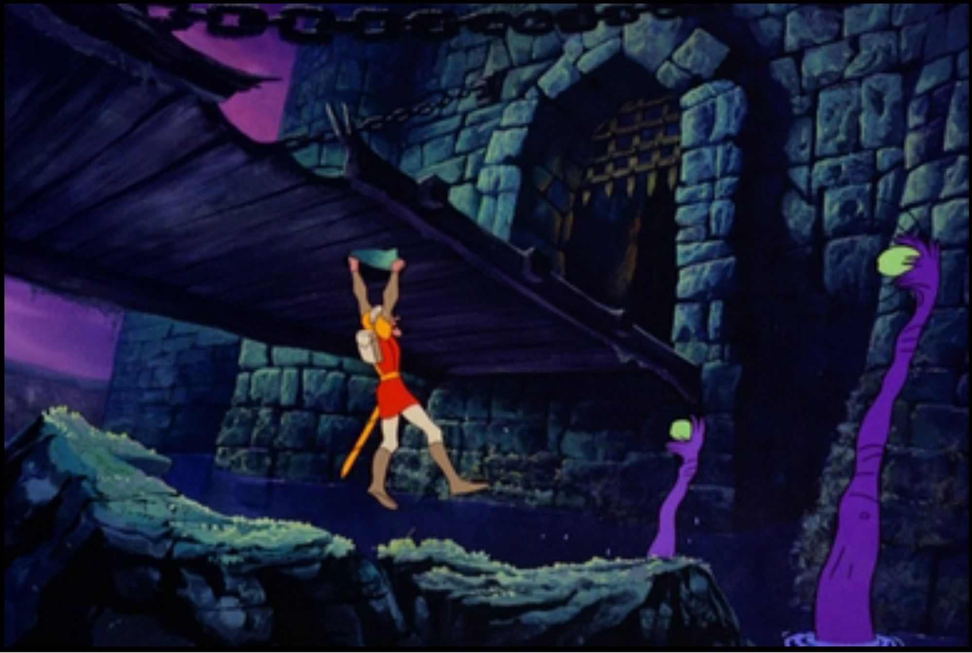 A screen shot from the 1983 arcade game Dragon’s Lair, a knight in a red tunic and high leather boots hangs by two hands from a castle’s drawbridge. Two purple tentacles protrude from the moat, each with an eye on the end watching the knight. A dark purple sky looms above.