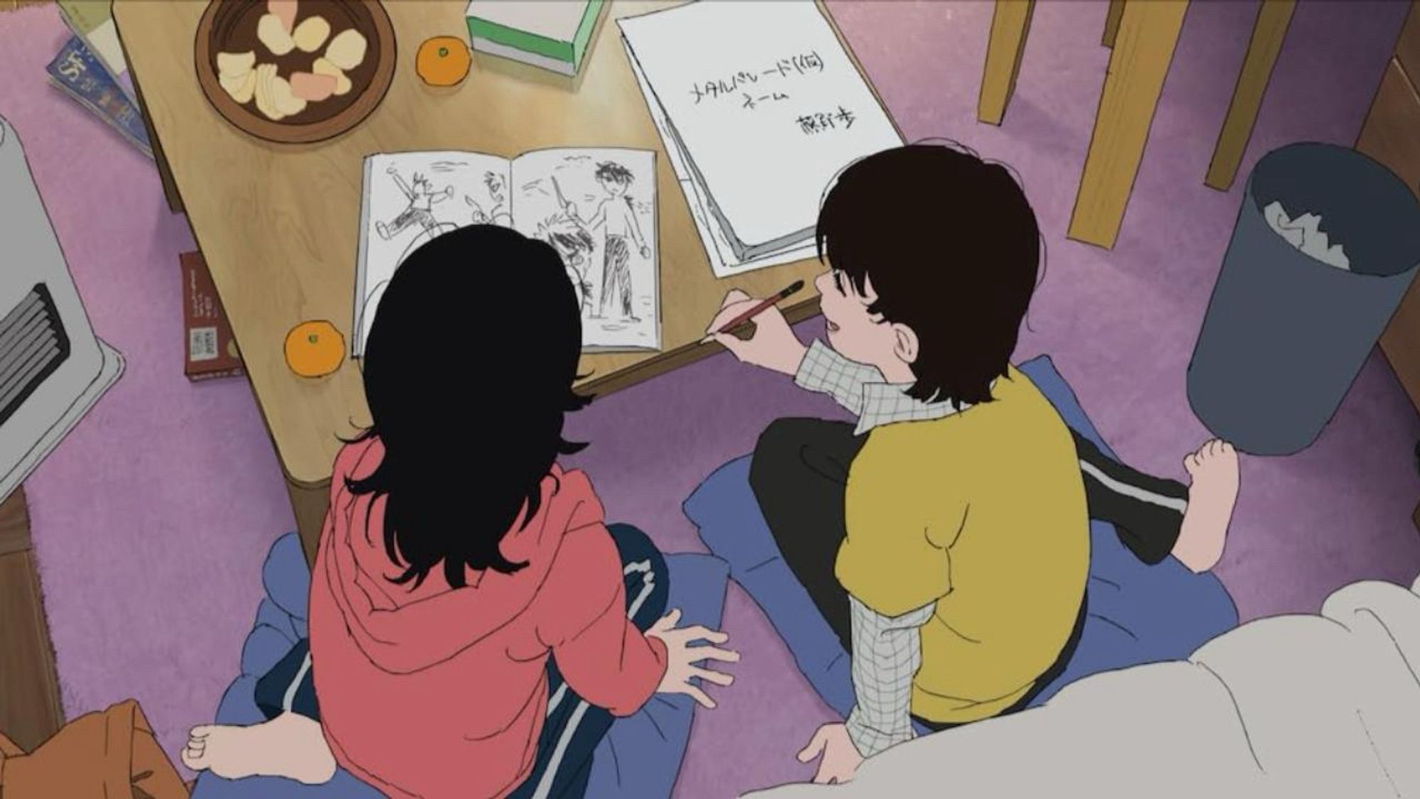 Look Back movie still of the main girls working on their manga in their room happily.