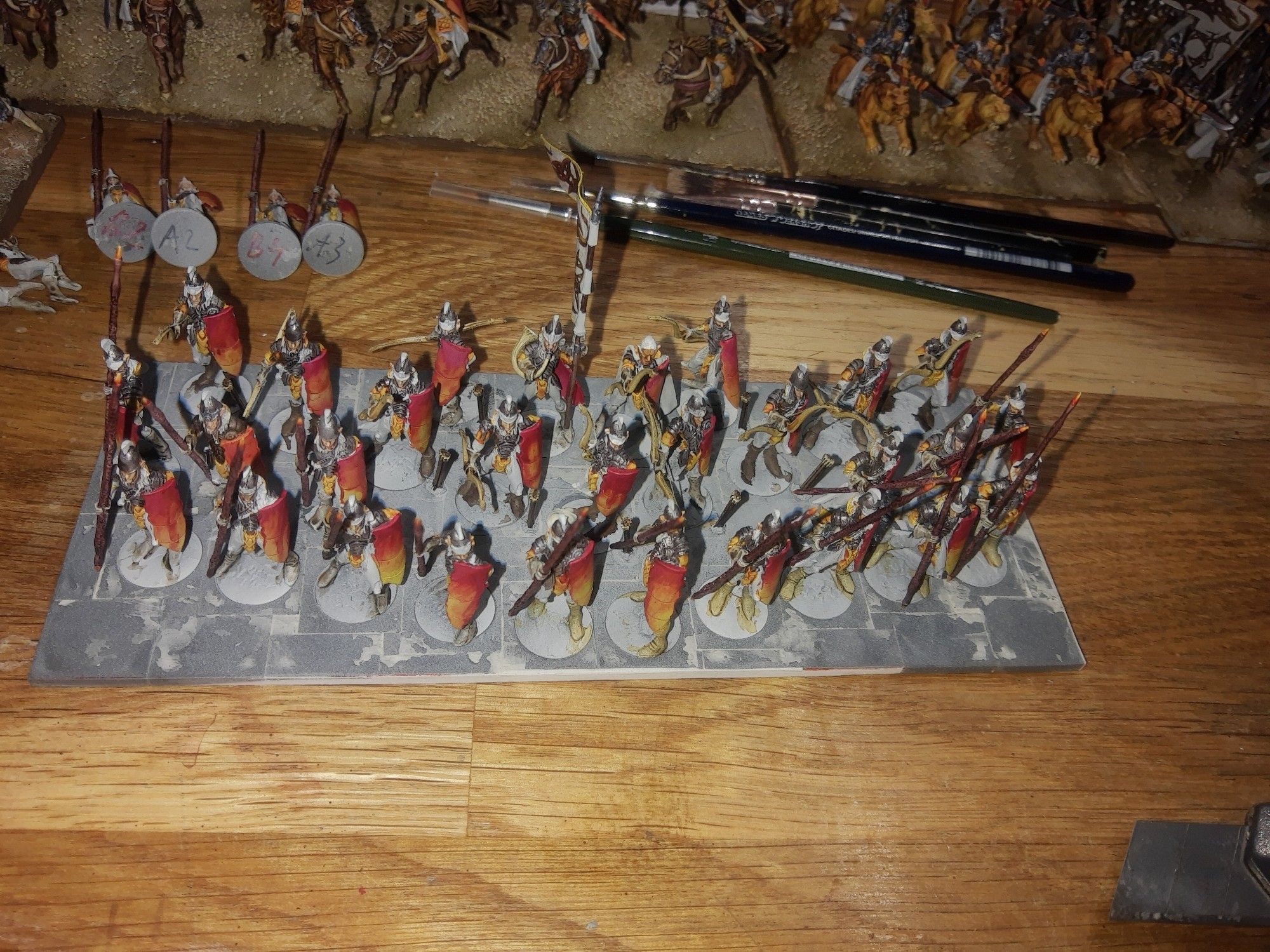 Mantic Games Elves Infantry with Bows and Spears on a Horde base