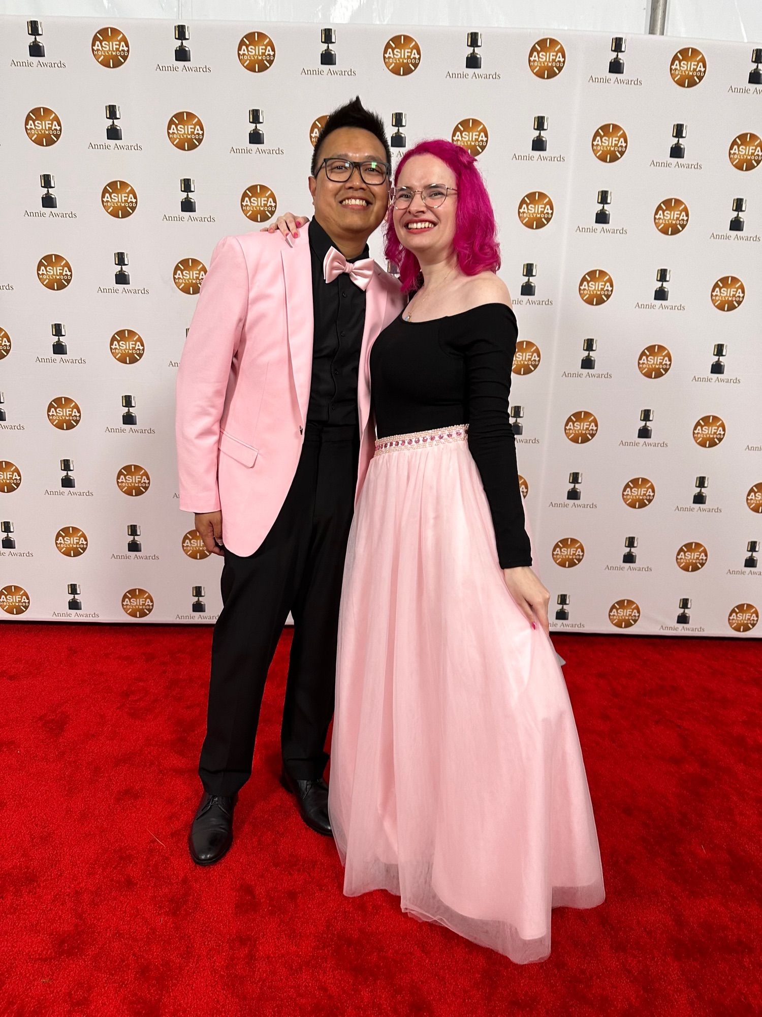 Ben and Jessie in matching pink & black outfits at the Annies