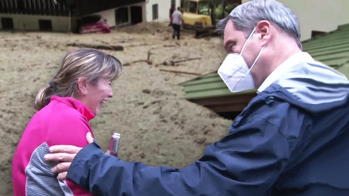 Archivbild: Söder berührt eine vor Verzweiflung schreiende und weinende Frau scheinbar mitfühlend an der Schulter. Ich ahne, er half ihr nicht, aber sie half ihm selbst in größter Not noch mit einem geilen Bild für seine Social Media und Pressearbeit, auf dem er sein Mitgefühl und seine Volksnähe präsentieren konnte