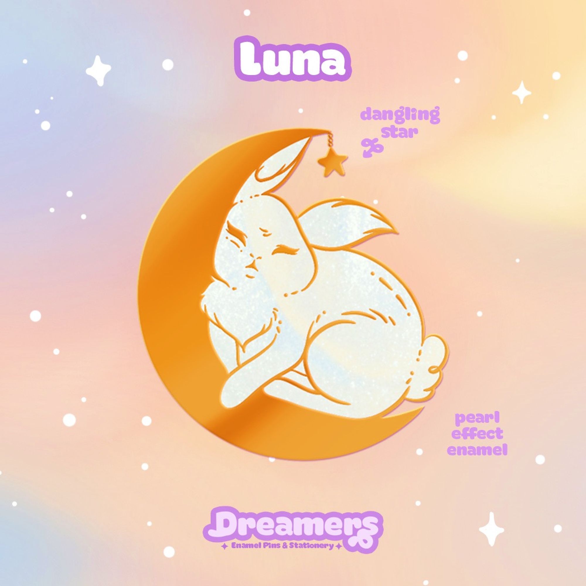 A digital representation of a golden enamel pin. The design features a bunny sleeping inside a crescent moon, with a dangling star hanging from the top and white pearlescent enamel. Above is written "Luna" and at the bottom "Dreamers" the name of the collection. 