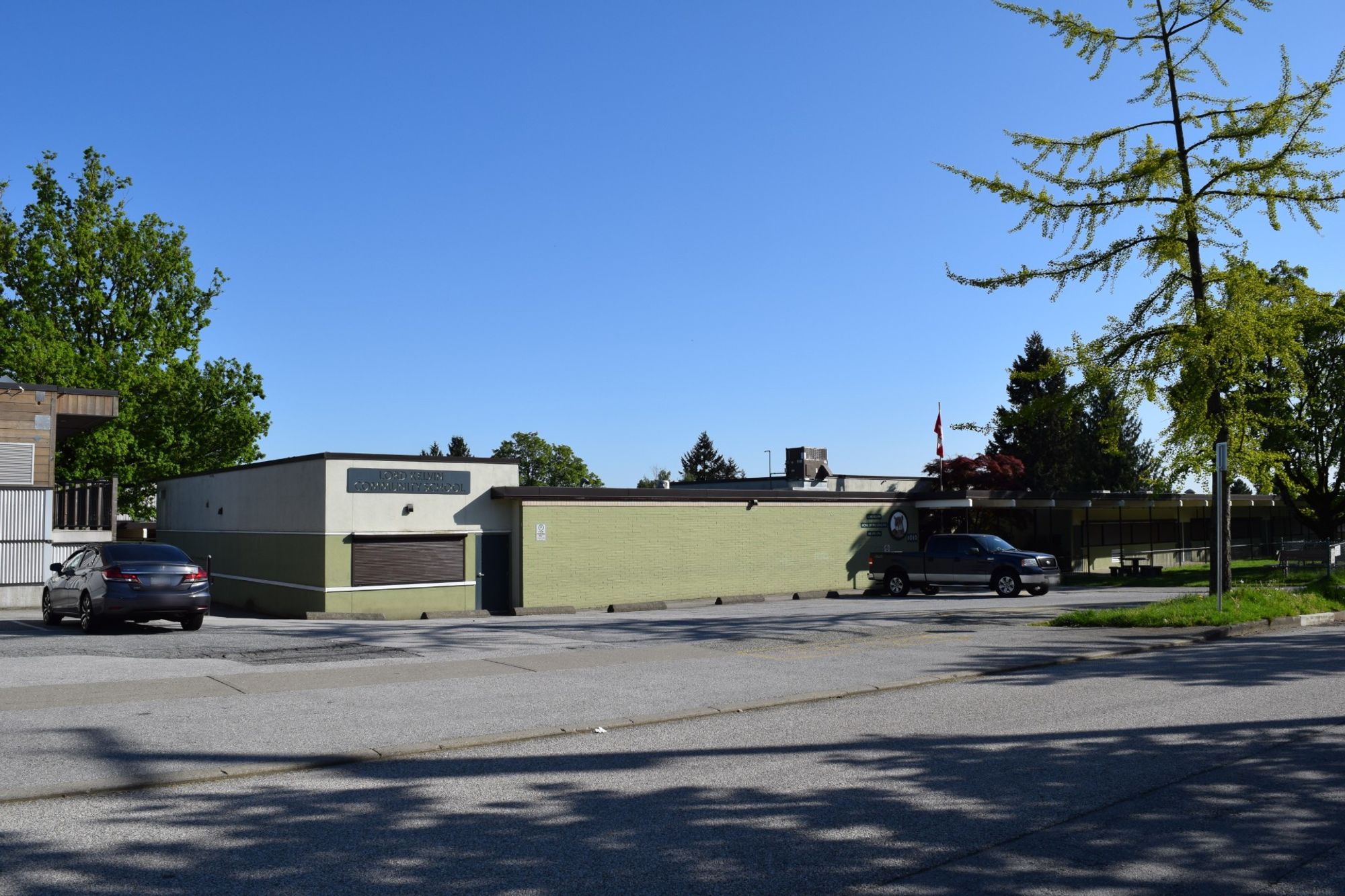 one-storey school building and parking lot