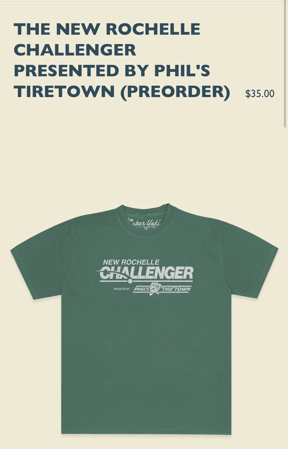 A shade of green, I don’t know the name of, tee that reads “New Rochelle Challengers Presented by Phil’s Tiretown”