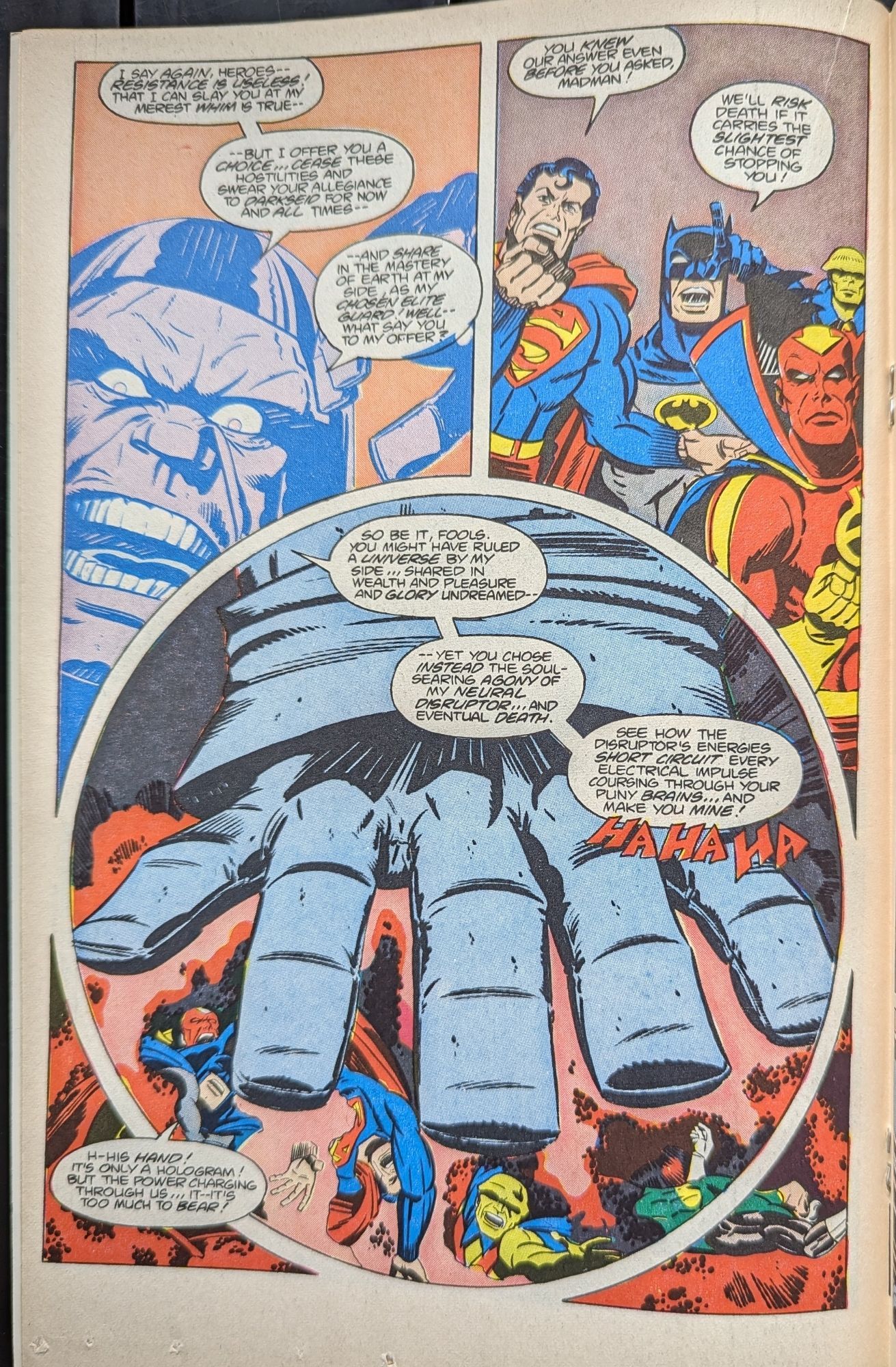 Darkseid smashes the heroes, laughing