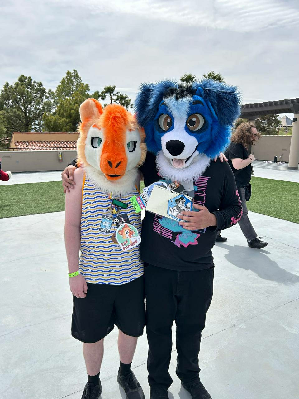 Two fursuiters standing side by side, Tarth (me) on the left and Sonoma on the right.