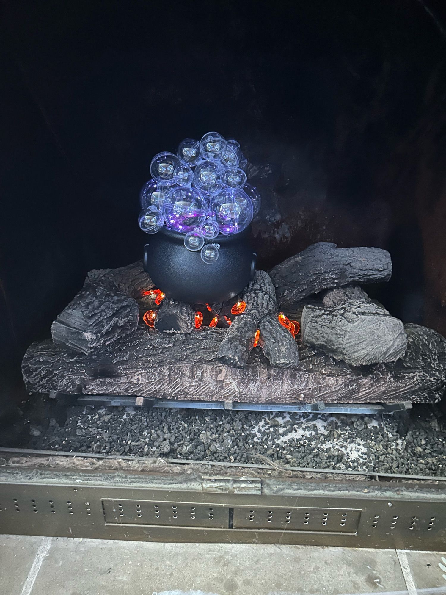 A bubbling cauldron in the fireplace. Super spooky