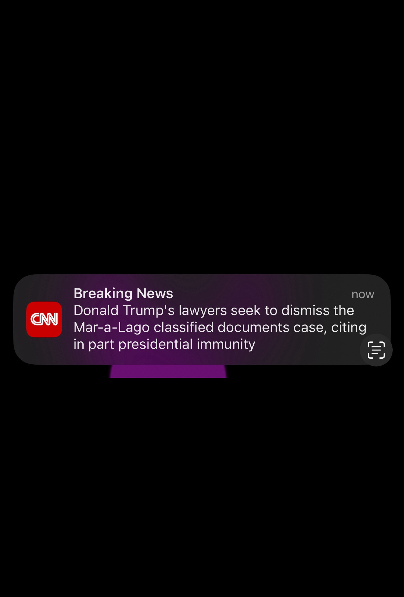 Screenshot of a CNN breaking news alert stating Donald Trump’s lawyers seek to dismiss the Mar-a-Lago classified documents case, citing in part presidential immunity.