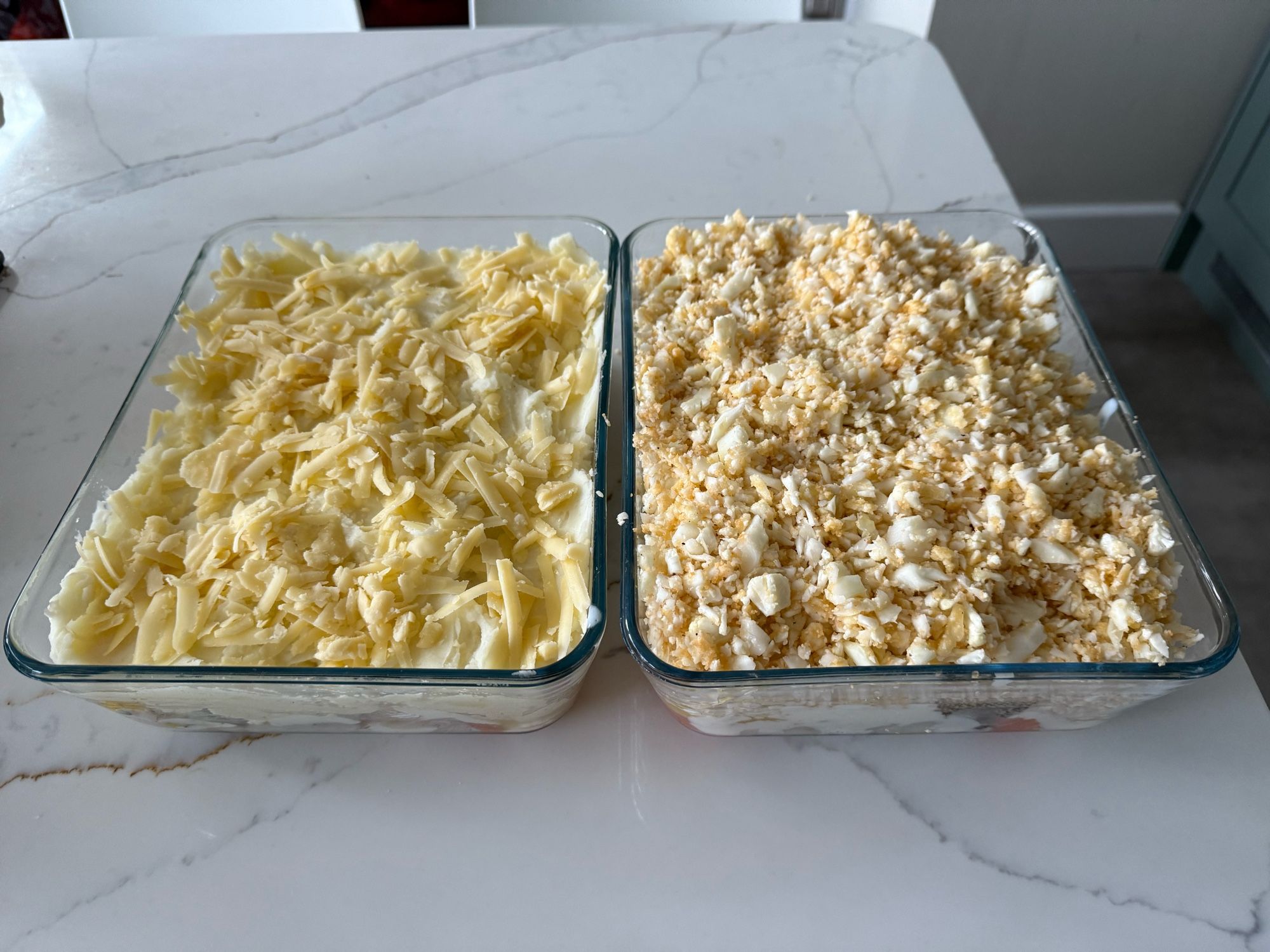 Fish pie with mash, fish pie with cauliflower cheese crust. Ready for the oven.