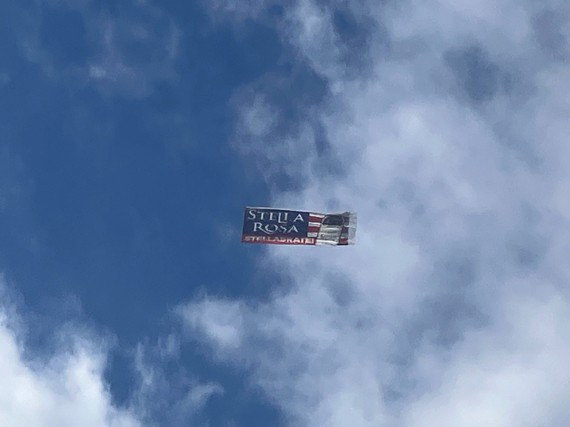 Banner in the sky reads 
“STELLA ROSA
STELLABRATE!”