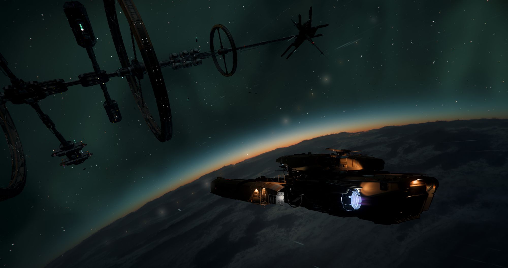 A yellow Drake Vulture flies towards a space station over the dark side of a planet in the game "Star Citizen".