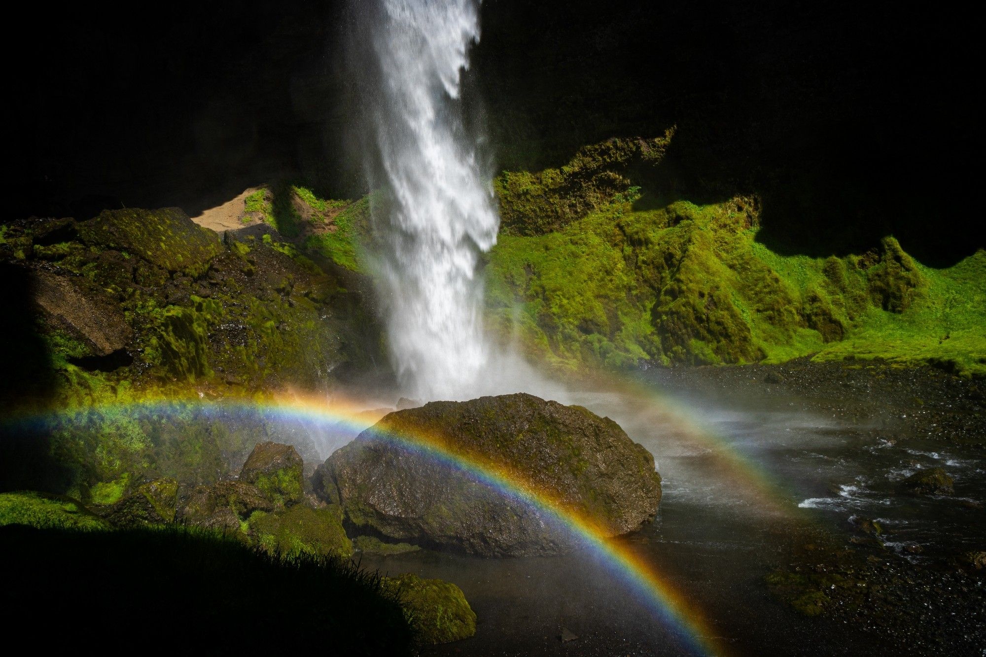 Kvernufoss waterfall with two rainbows